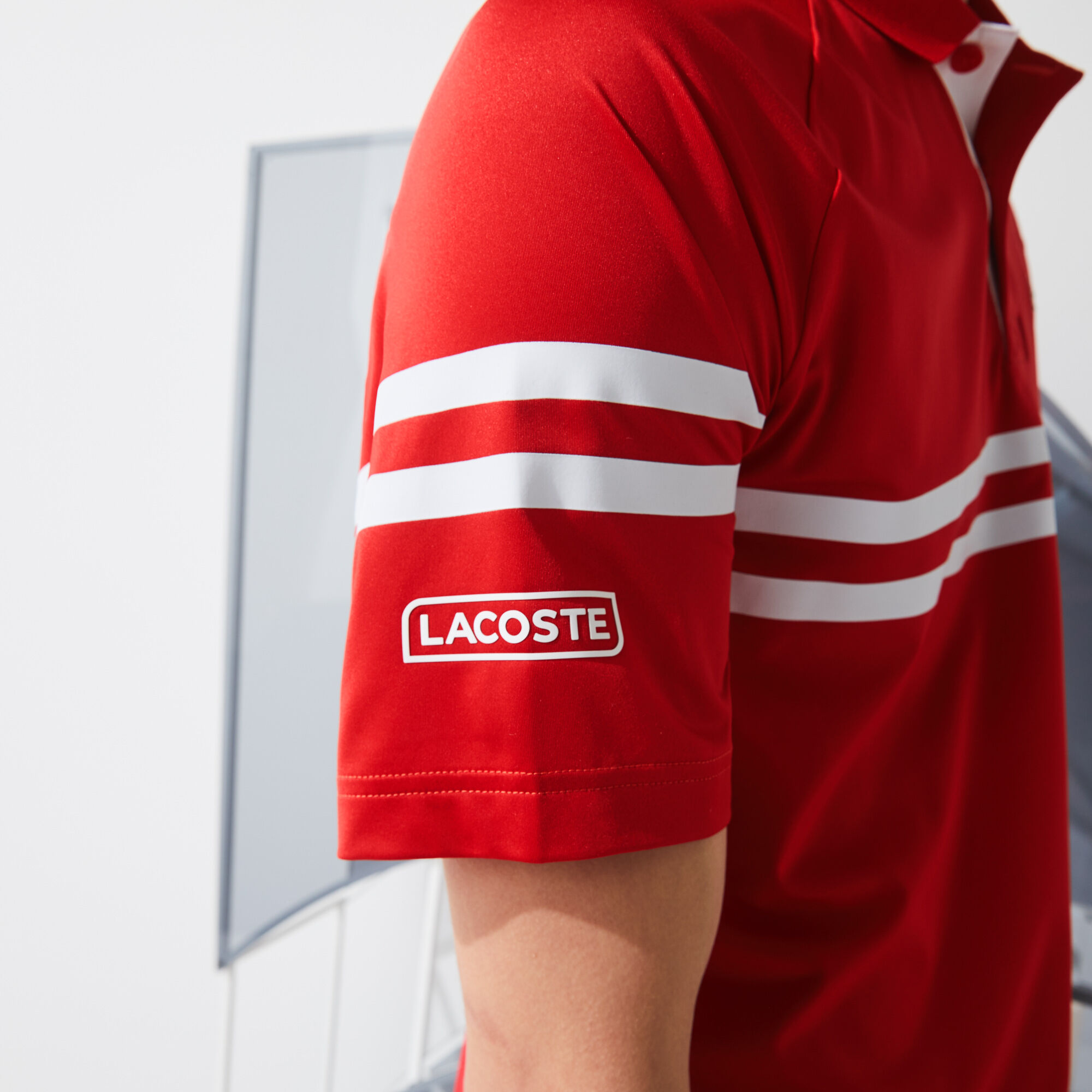 قميص بولو مقلم فائق الخفة للرجال مجموعة Lacoste SPORT و Novak Djokovic قميص بولو مقلم فائق الخفة للرجال مجموعة Lacoste SPORT و Novak Djokovic