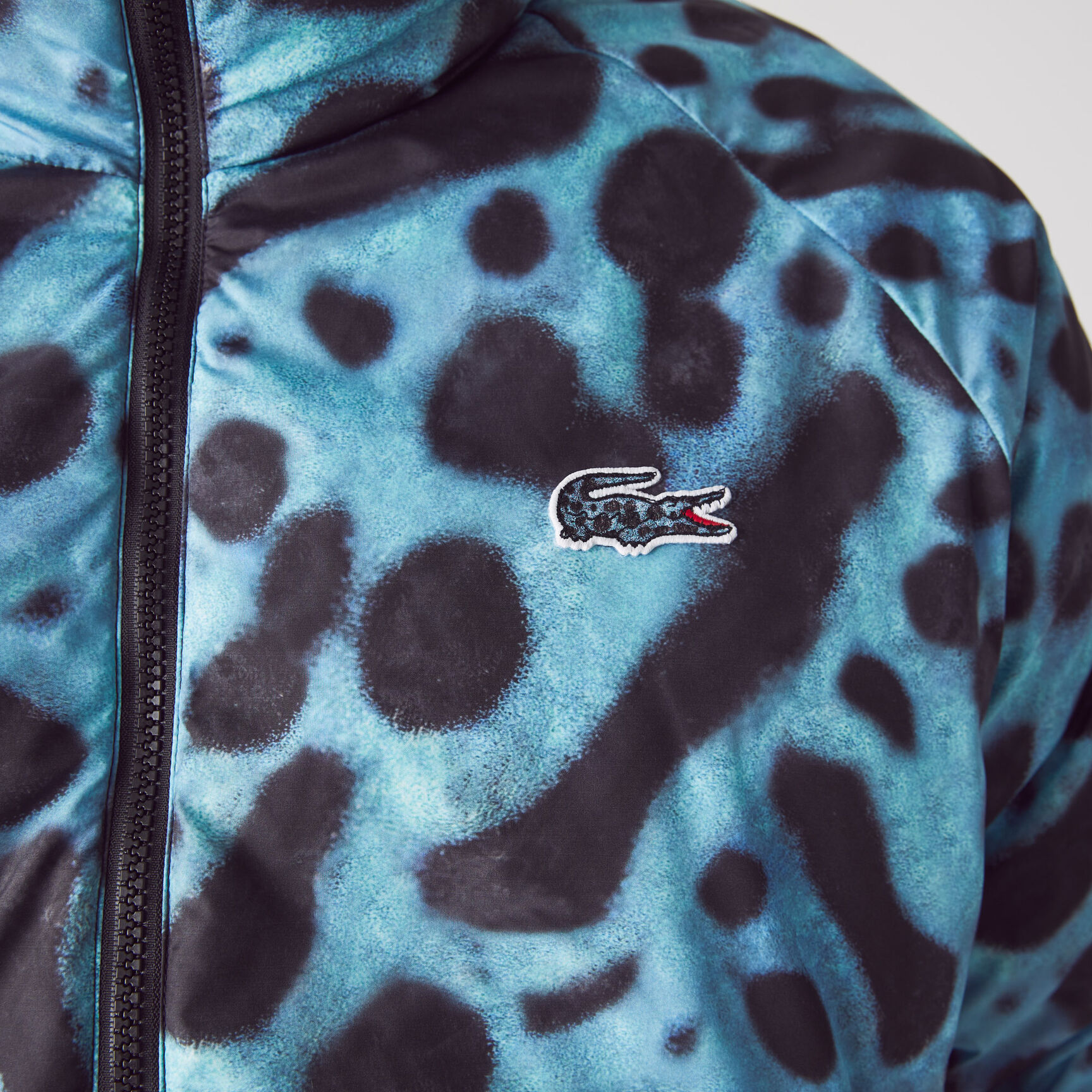 جاكيت مبطن بوجهين وسحّاب للرجال مجموعة Lacoste x National Geographic