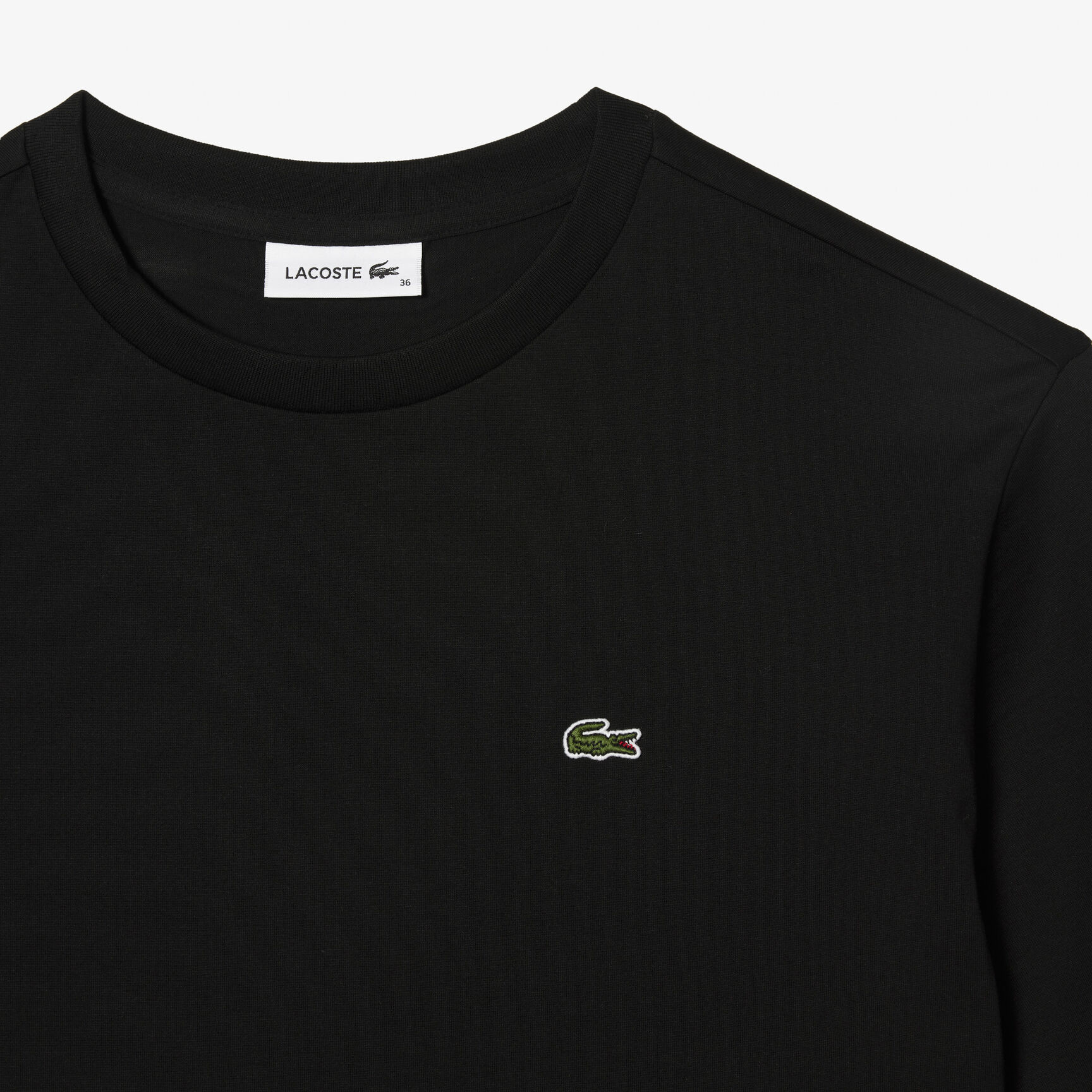 تي شيرت قطن بقصّة فضفاضة وفتحة رقبة على شكل حرف V&rlm; للنساء