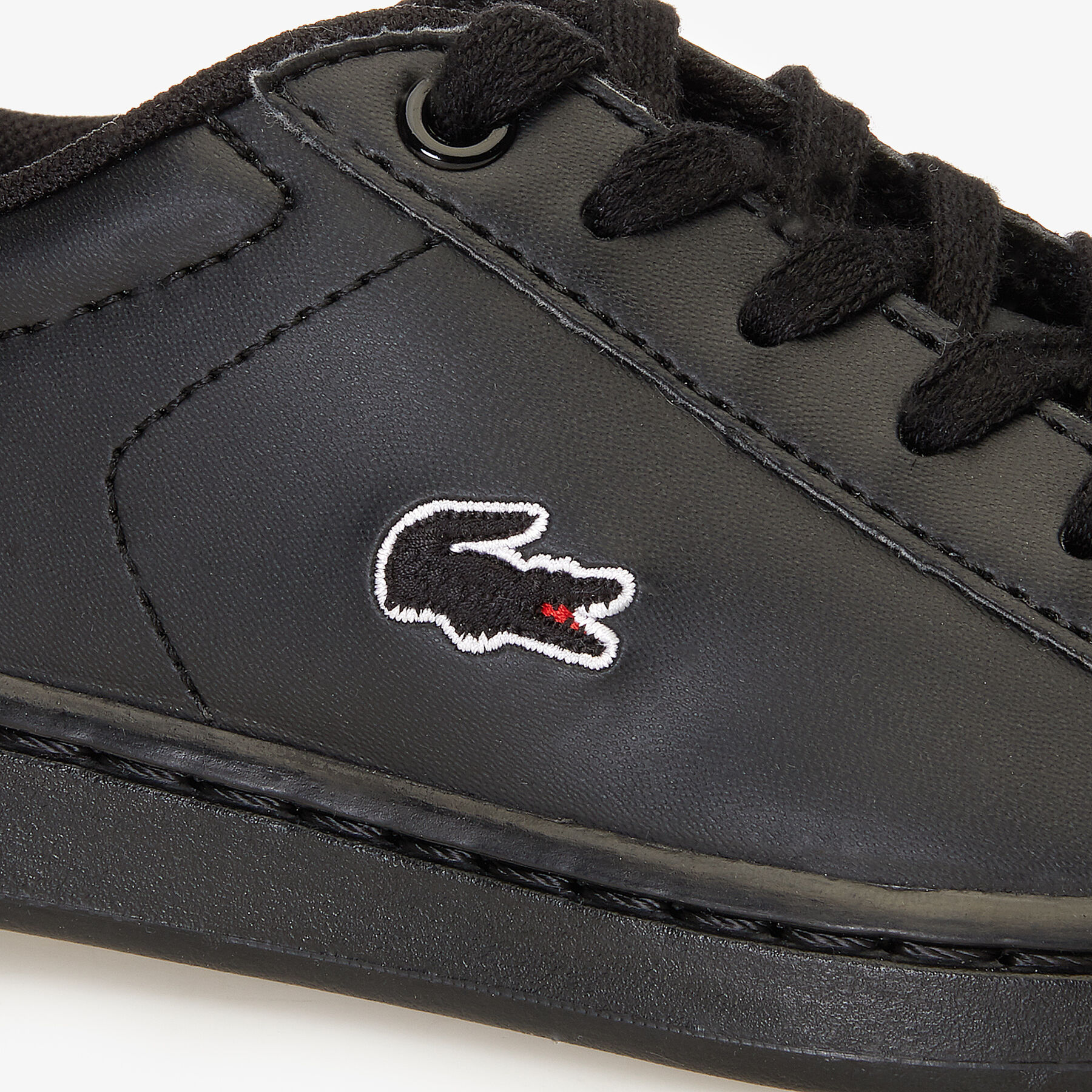 حذاء رياضي بأربطة من مواد صناعية وبطانة شبكية مجموعة Carnaby Evo للأطفال لاكوست حذاء رياضي بأربطة من مواد صناعية وبطانة شبكية مجموعة carnaby evo للأطفال