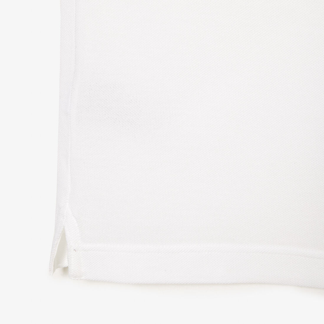 قميص بولو بيكيه بقصة ضيقة L.12.12 قميص بولو بيكيه بقصة ضيقة L.12.12