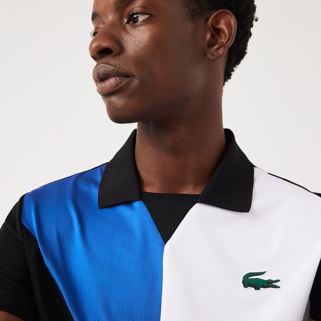 تيشيرت بولو تنس بيكيه سريع الجفاف بتصميم مقسم بألوان للرجال مجموعة Lacoste SPORT تيشيرت بولو تنس بيكيه سريع الجفاف بتصميم مقسم بألوان للرجال مجموعة Lacoste SPORT
