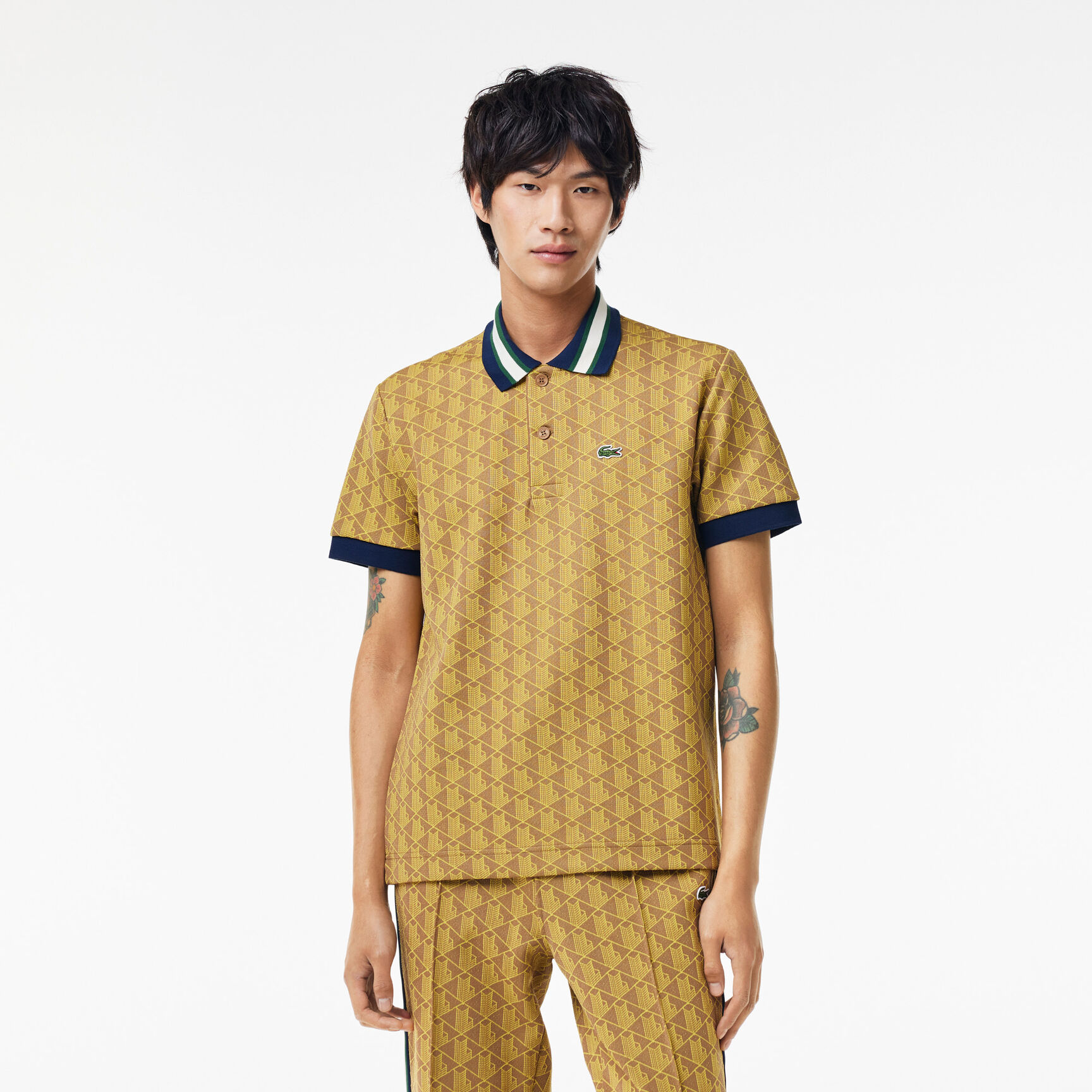 قميص بولو كلاسيكي بقصّة كلاسيكية من قماش الجاكار أحادي اللون قميص بولو كلاسيكي بقصّة كلاسيكية من قماش الجاكار أحادي اللون