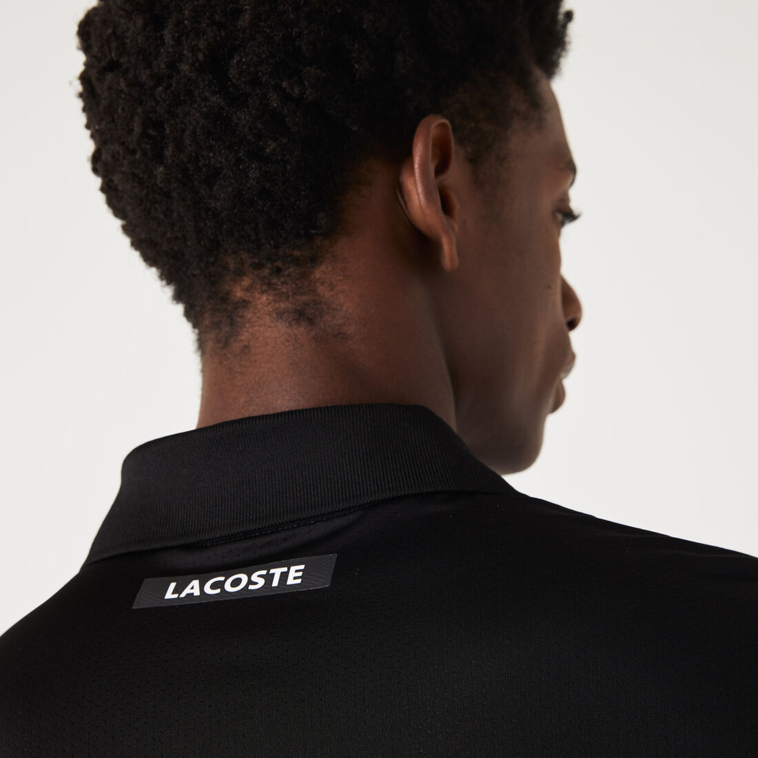 تيشيرت بولو تنس بيكيه سريع الجفاف بتصميم مقسم بألوان للرجال مجموعة Lacoste SPORT تيشيرت بولو تنس بيكيه سريع الجفاف بتصميم مقسم بألوان للرجال مجموعة Lacoste SPORT