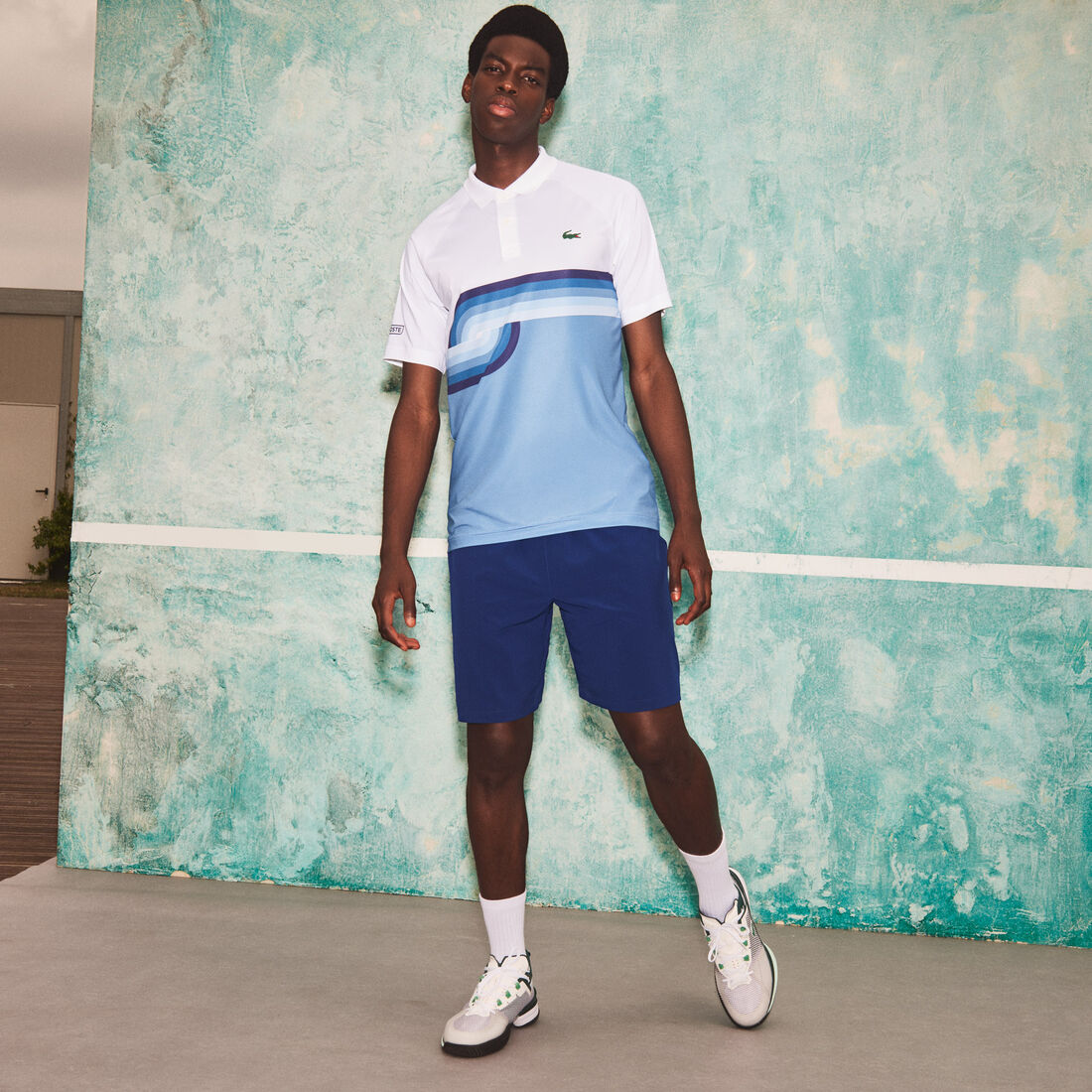 بولو رجالي ذو قصة عادية وطبعة Lacoste SPORT و Novak Djokovic بولو رجالي ذو قصة عادية وطبعة Lacoste SPORT و Novak Djokovic