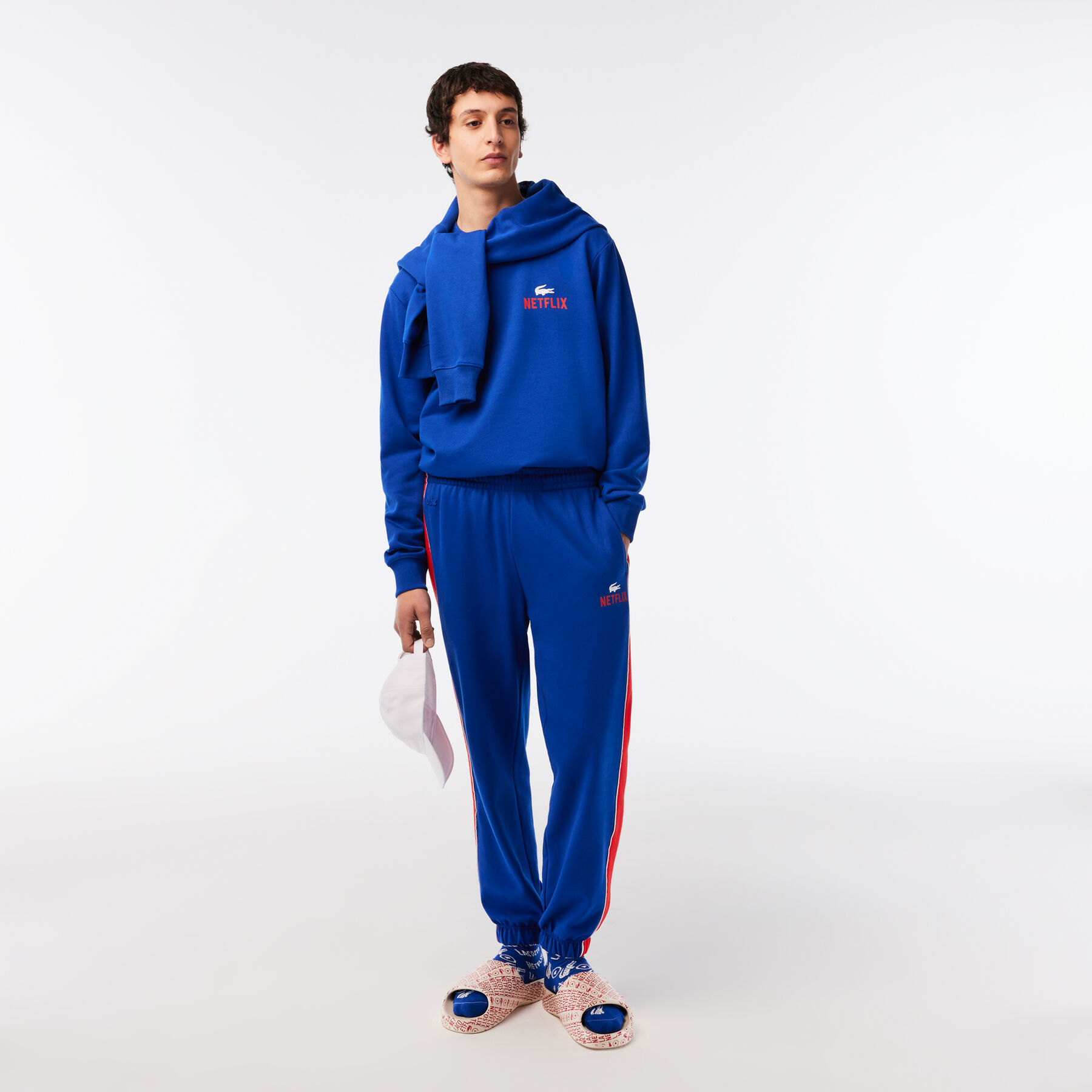 سويت شيرت بفتحة رقبة مستديرة وطبعة في الخلف للجنسين مجموعة Lacoste x Netflix لاكوست سويت شيرت بفتحة رقبة مستديرة وطبعة في الخلف للجنسين مجموعة lacoste x netflix