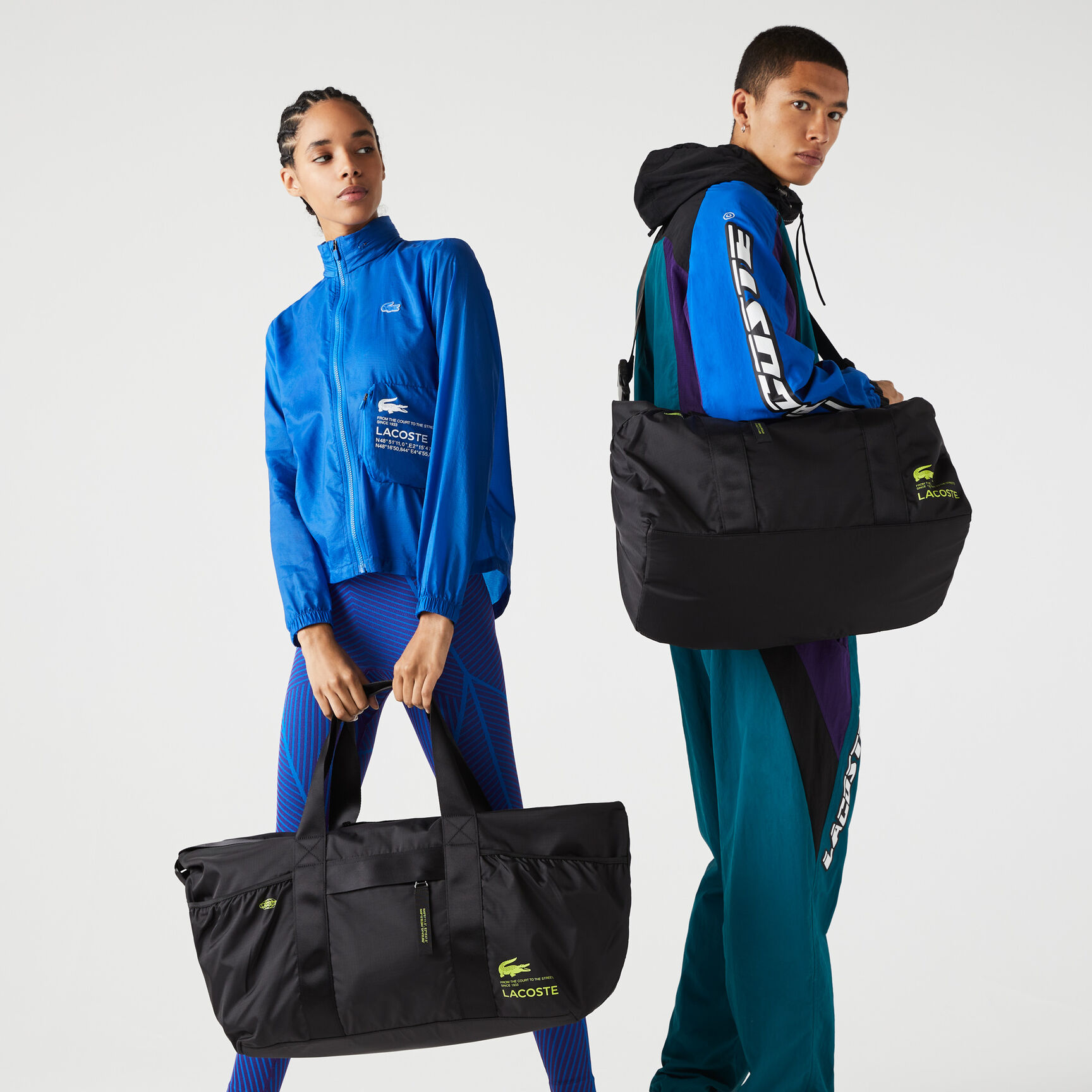 حقيبة لعطلات نهاية الأسبوع بشعار لاكوست بلون مغاير للجنسين حقيبة لعطلات نهاية الأسبوع بشعار لاكوست بلون مغاير للجنسين