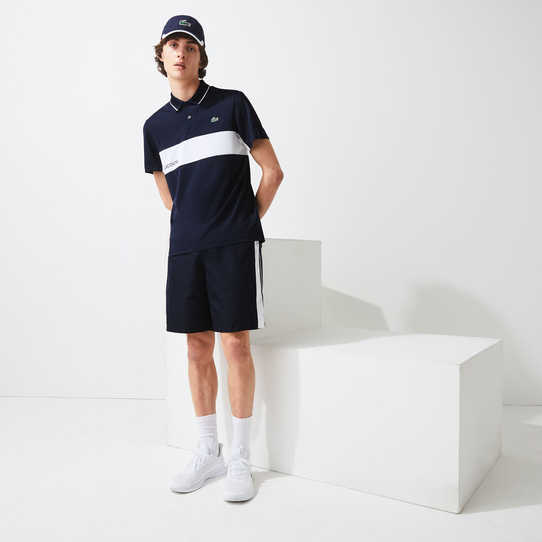 قميص بولو مقاوم مسامي للرجال مع كتل لونية مجموعة Lacoste SPORT قميص بولو مقاوم مسامي للرجال مع كتل لونية مجموعة Lacoste SPORT
