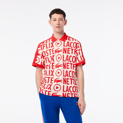 تيشيرت بولو قطن عضوي مطبوع بقصة فضفاضة للرجال مجموعة Lacoste X Netflix