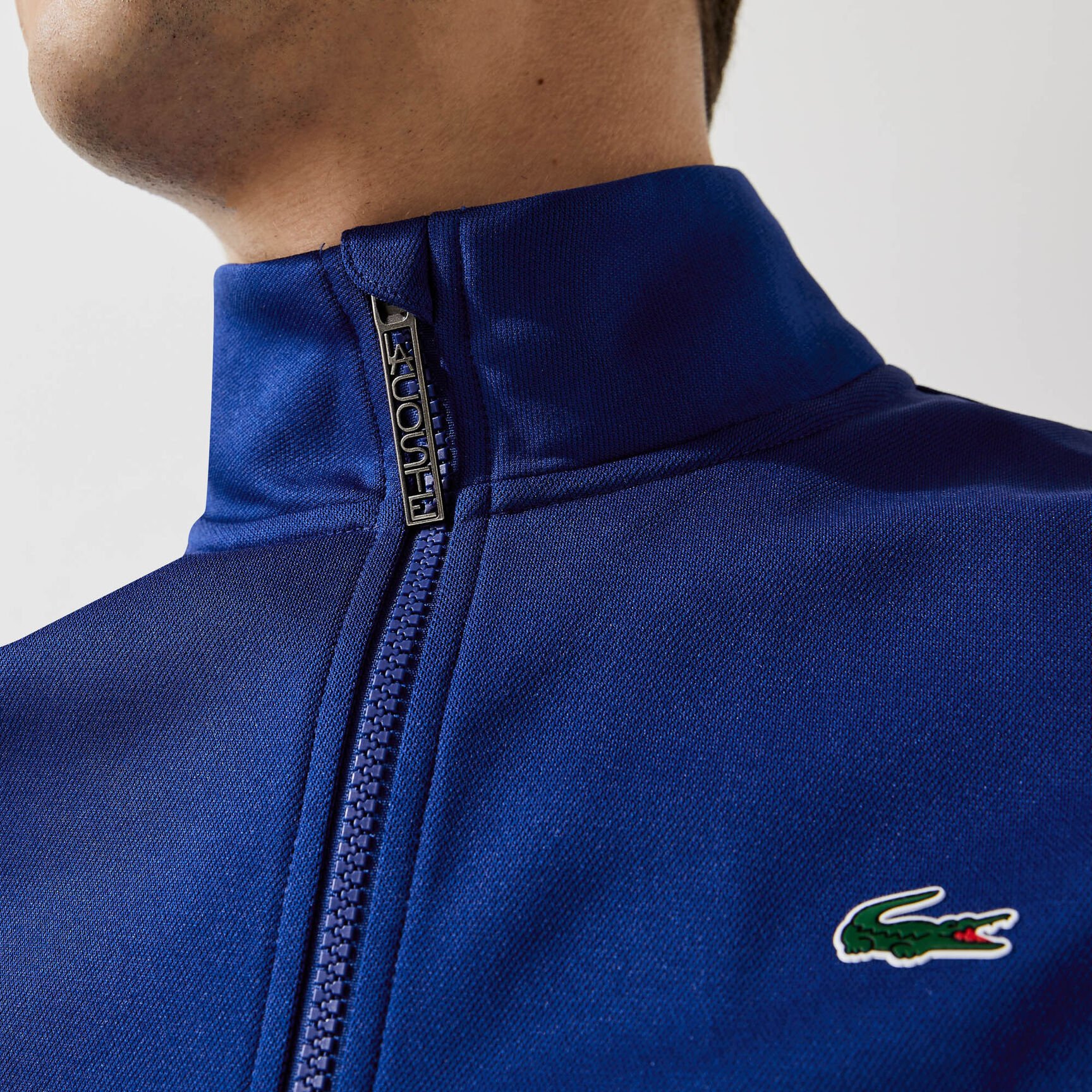 كنزة من مجموعة Lacoste SPORT ثنائية اللون مقاومة من بيكيه للرجال كنزة من مجموعة Lacoste SPORT ثنائية اللون مقاومة من بيكيه للرجال