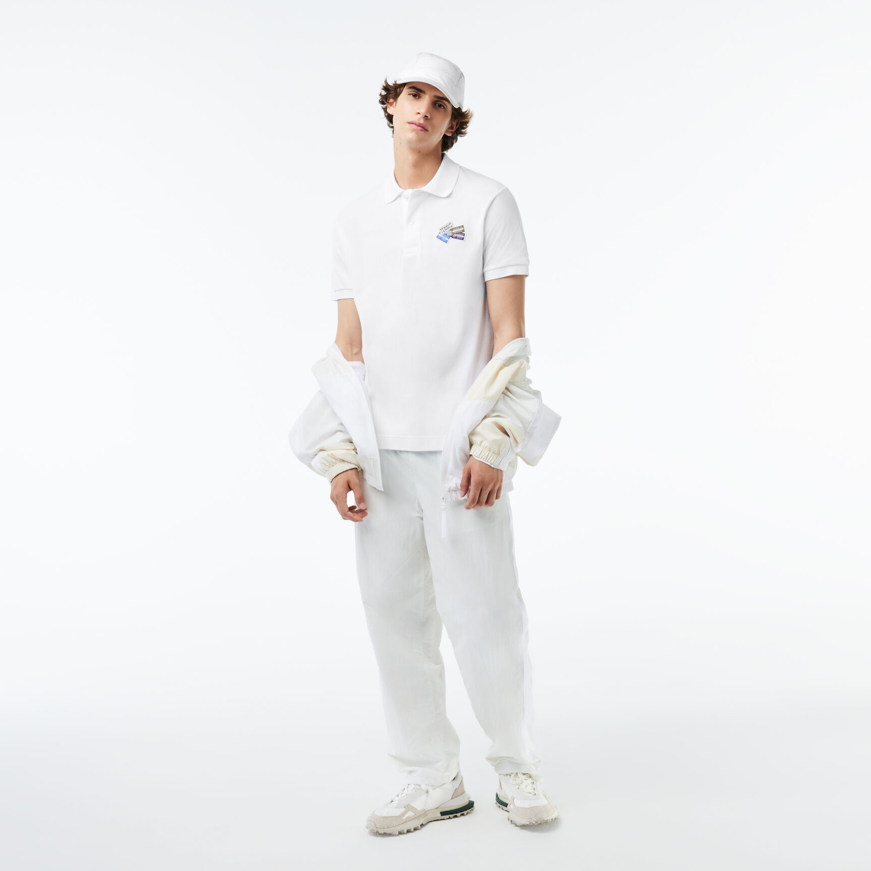 تي شيرت بولو بطبعة رقع بلونين من مجموعة Original L.12.12 تي شيرت بولو بطبعة رقع بلونين من مجموعة Original L.12.12