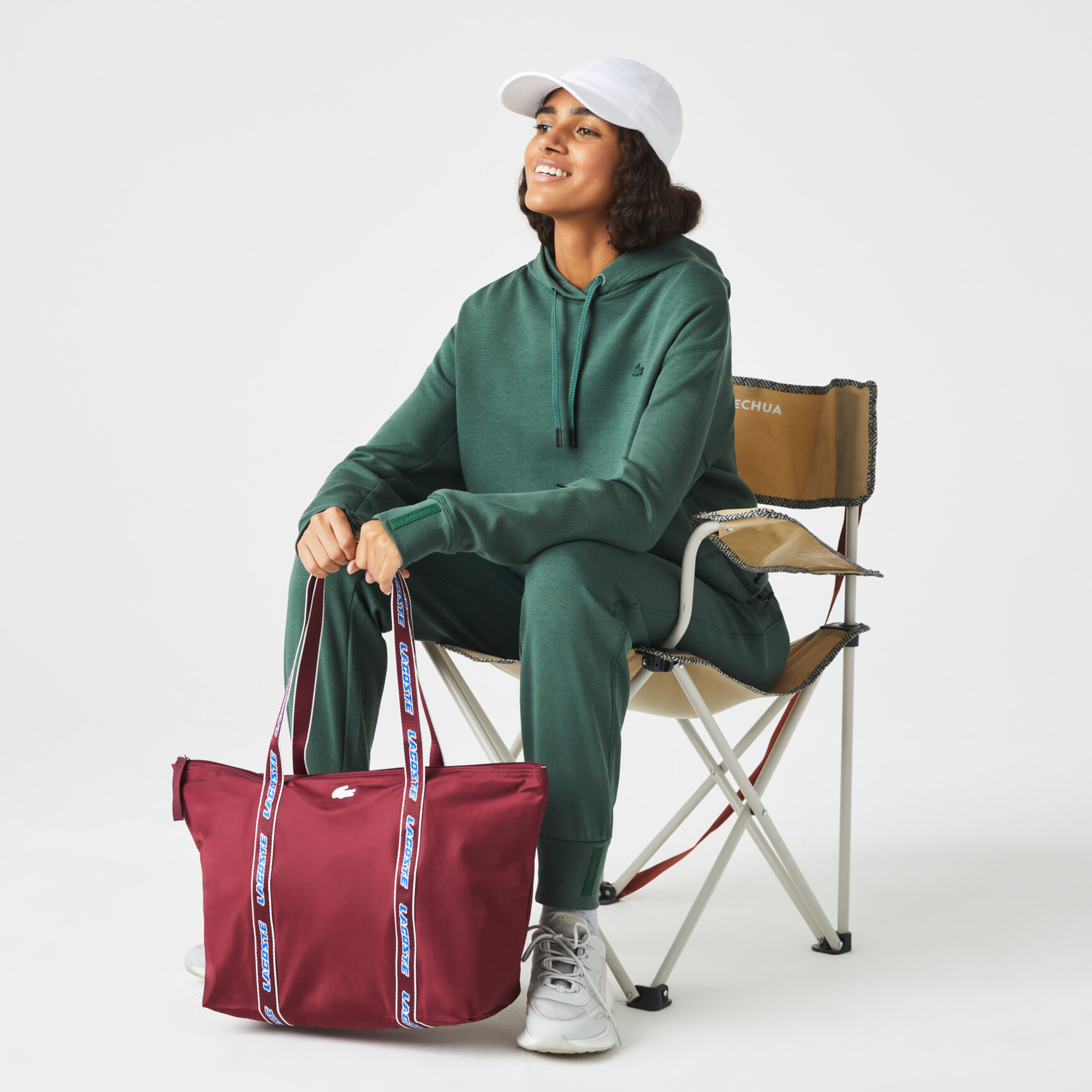 حقيبة يد لاكوست مقسمة بألوان بيد مزينة بشعار الماركة للنساء