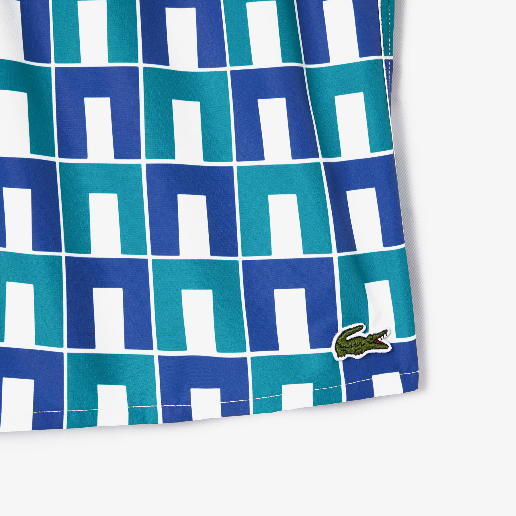 lacoste mid length robert george print swim trunks