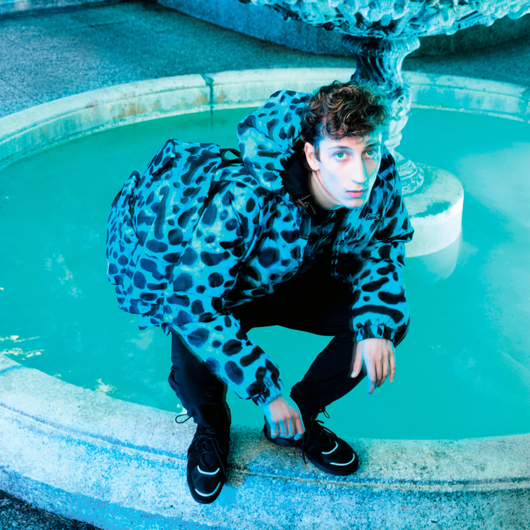 جاكيت مبطن بوجهين وسحّاب للرجال مجموعة Lacoste x National Geographic