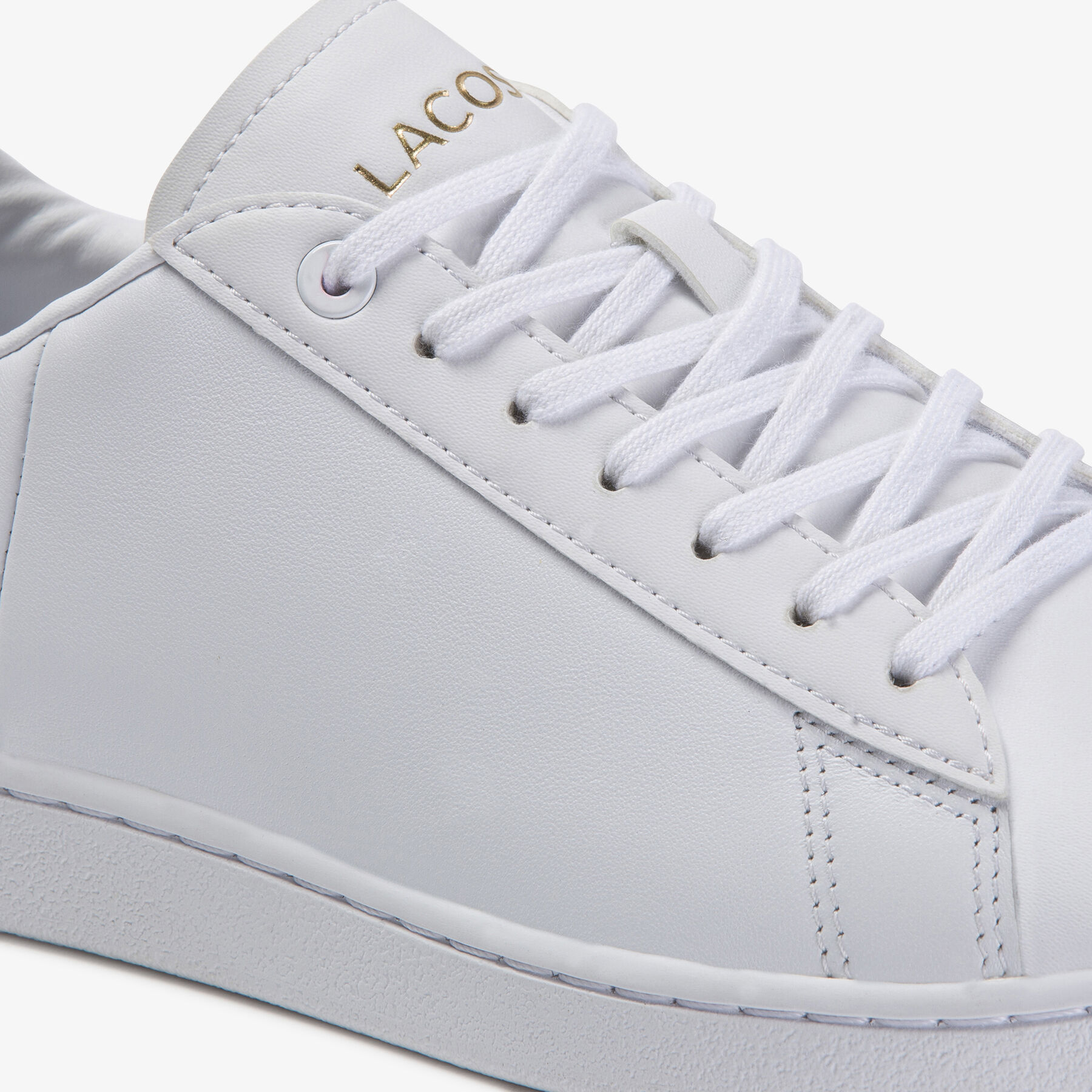 lacoste women s carnaby evo tonal leather and synthetic trainers