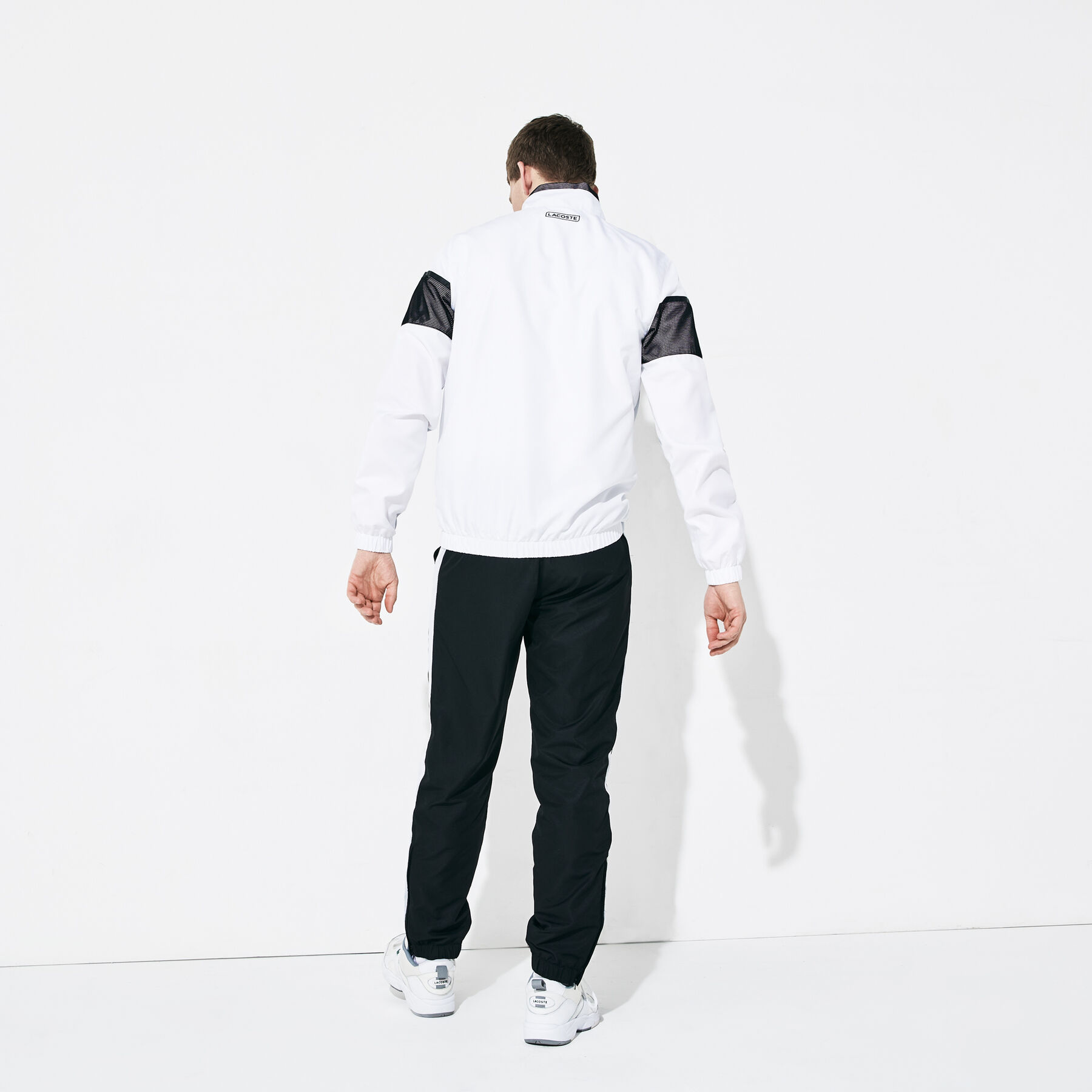 لاكوست بذلة رياضية للعب رياضة التنس من الجيرسيه والتفتا من مجموعة lacoste sport للرجال