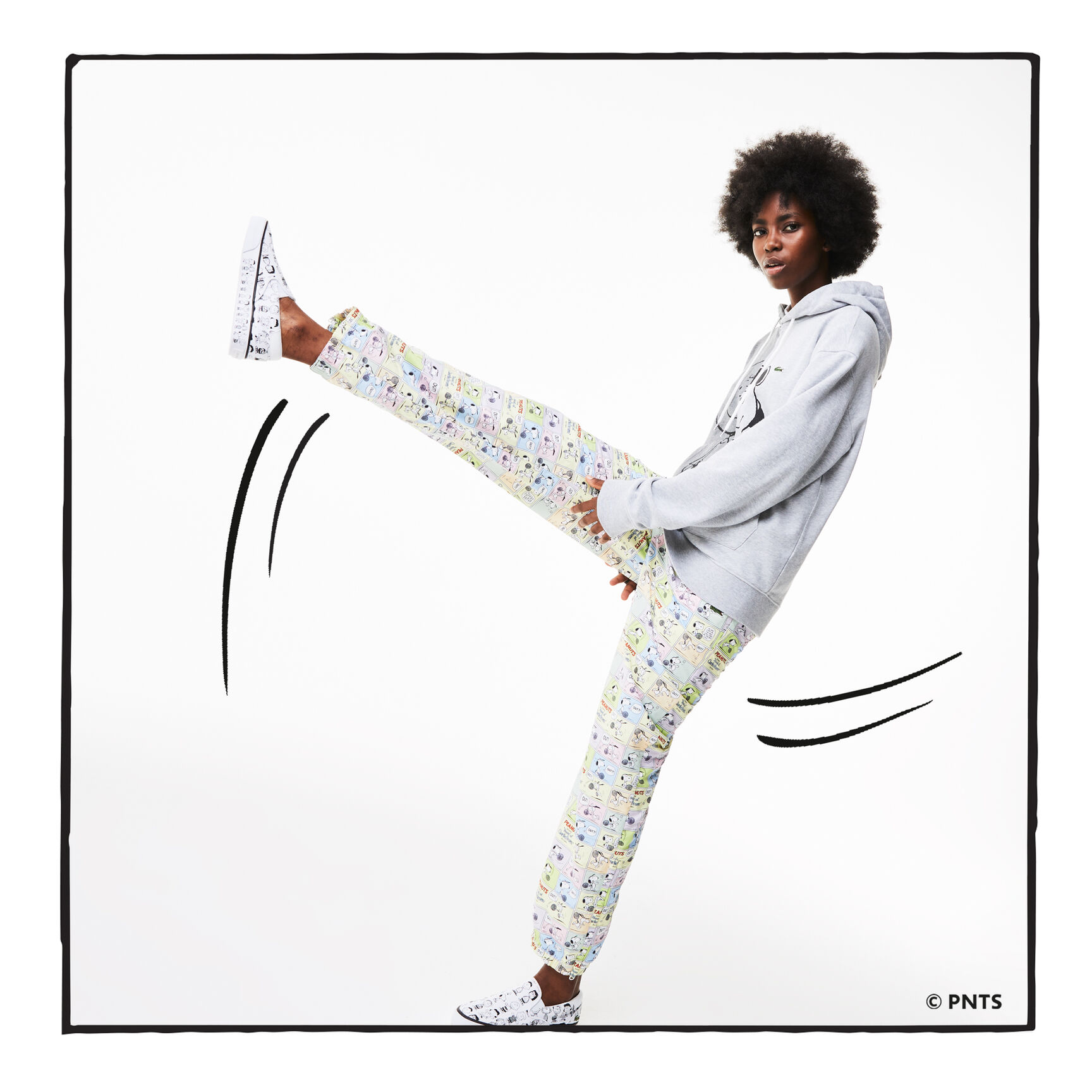 بنطلون رياضي بطبعة خفيفة من Lacoste x Peanuts للجنسين