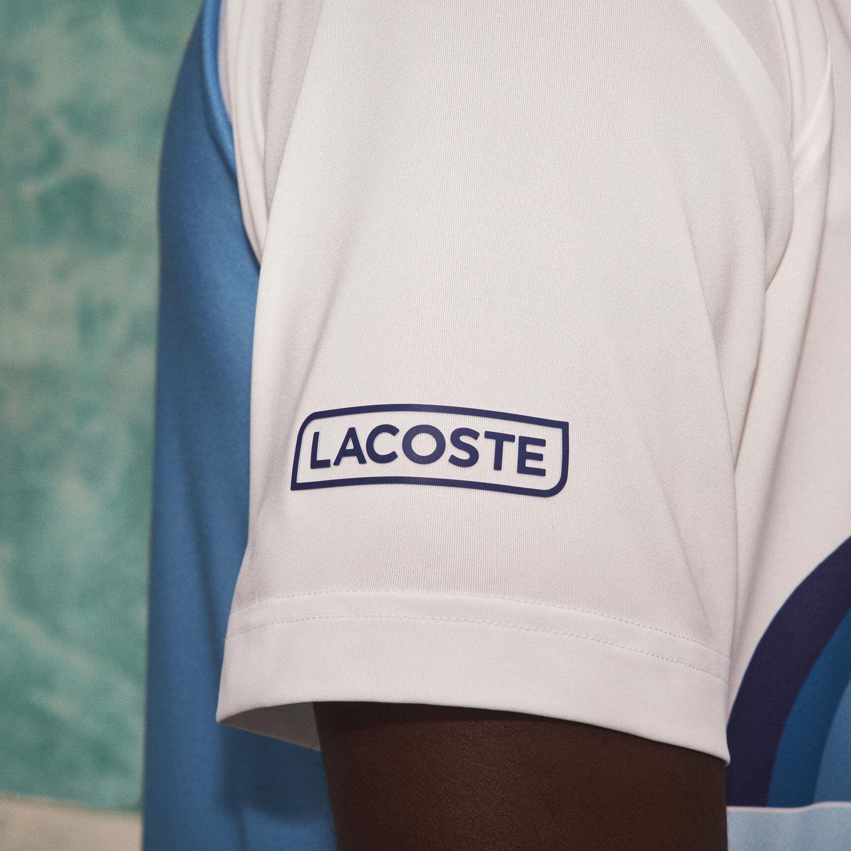 بولو رجالي ذو قصة عادية وطبعة Lacoste SPORT و Novak Djokovic بولو رجالي ذو قصة عادية وطبعة Lacoste SPORT و Novak Djokovic