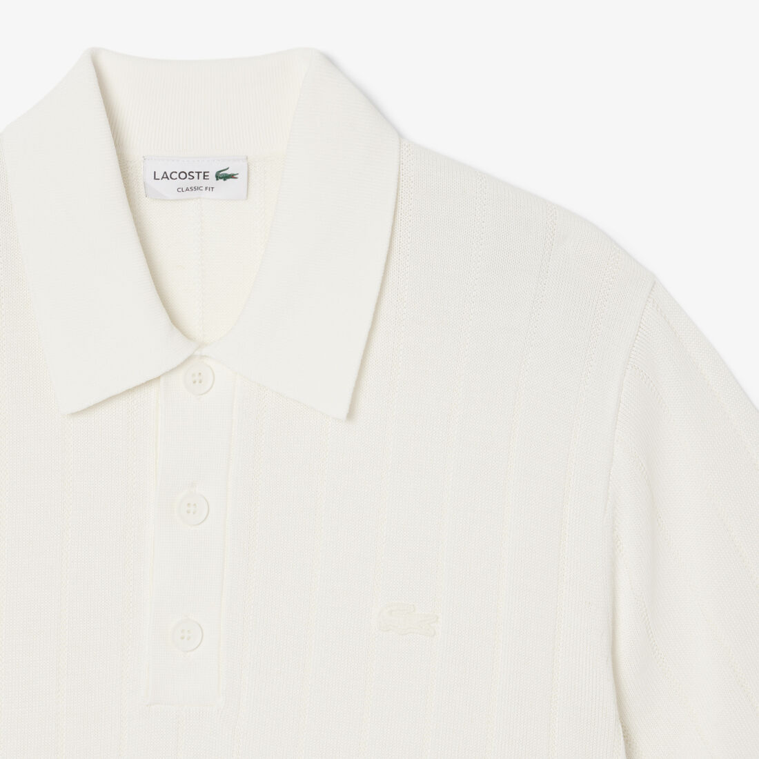 كنزة محبوكة بتصميم مضلع انسيابي وياقة بولو كنزة محبوكة بتصميم مضلع انسيابي وياقة بولو