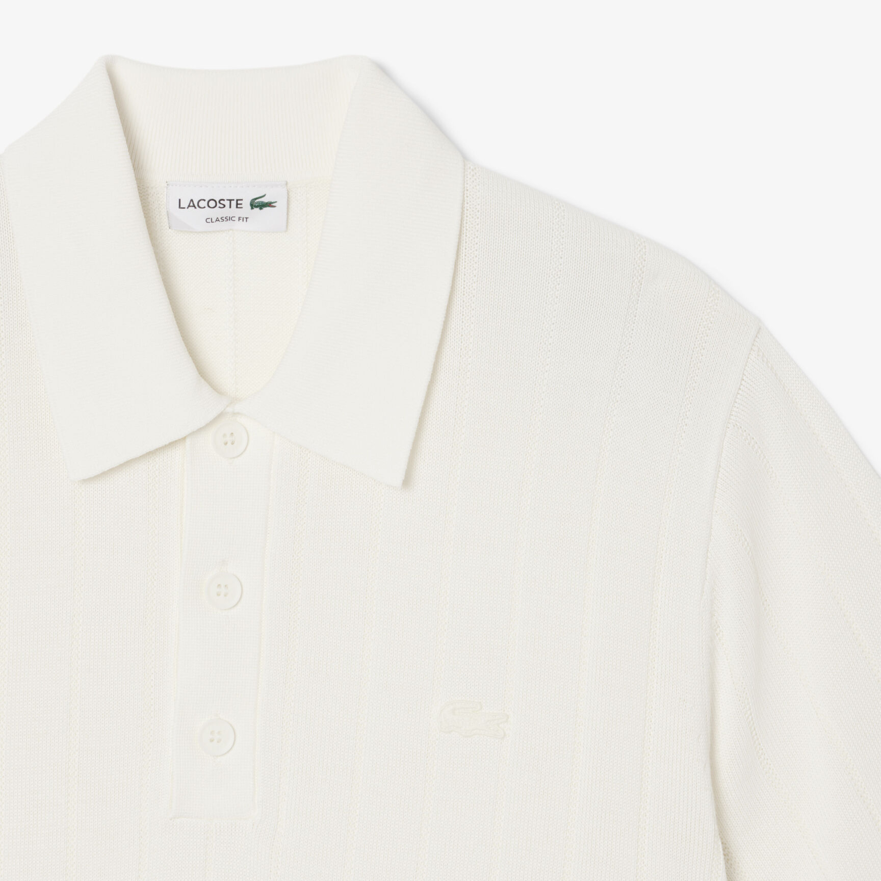 كنزة محبوكة بتصميم مضلع انسيابي وياقة بولو كنزة محبوكة بتصميم مضلع انسيابي وياقة بولو