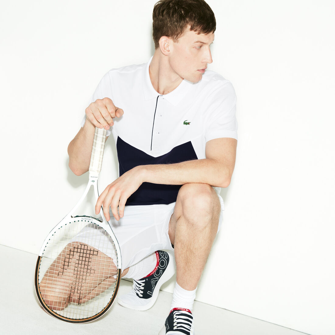 قميص تنس بولو للرجال من قطن شديد الخفة وألوان متعددة من مجموعة Lacoste SPORT