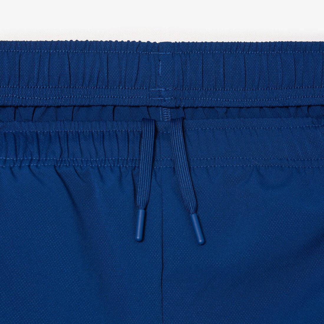 شورت تنس خفيف الوزن غير مُبطن شورت تنس خفيف الوزن غير مُبطن