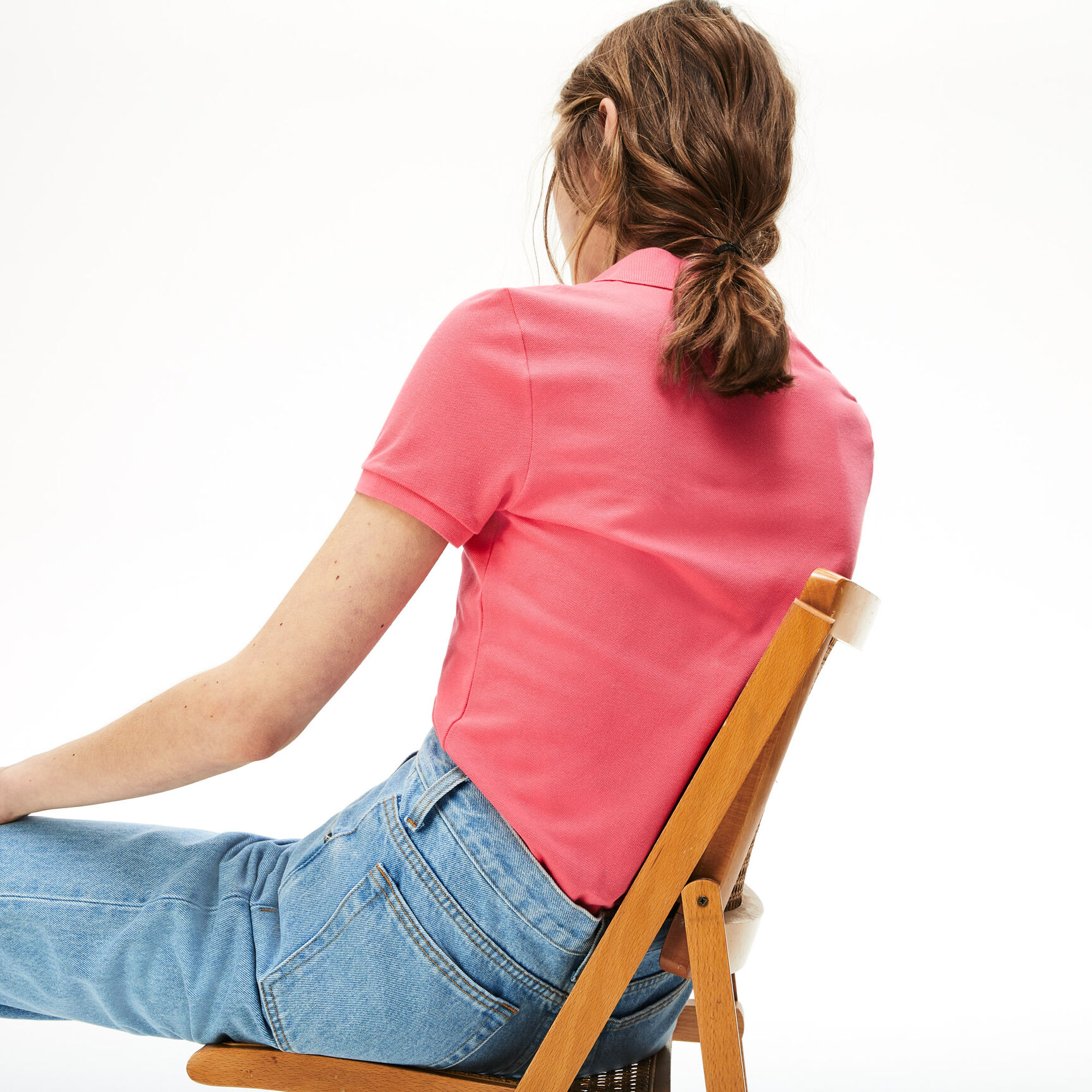 قميص بولو نسائي من قطن ميني بيكيه المرن ذو قصة ضيقة من Lacoste