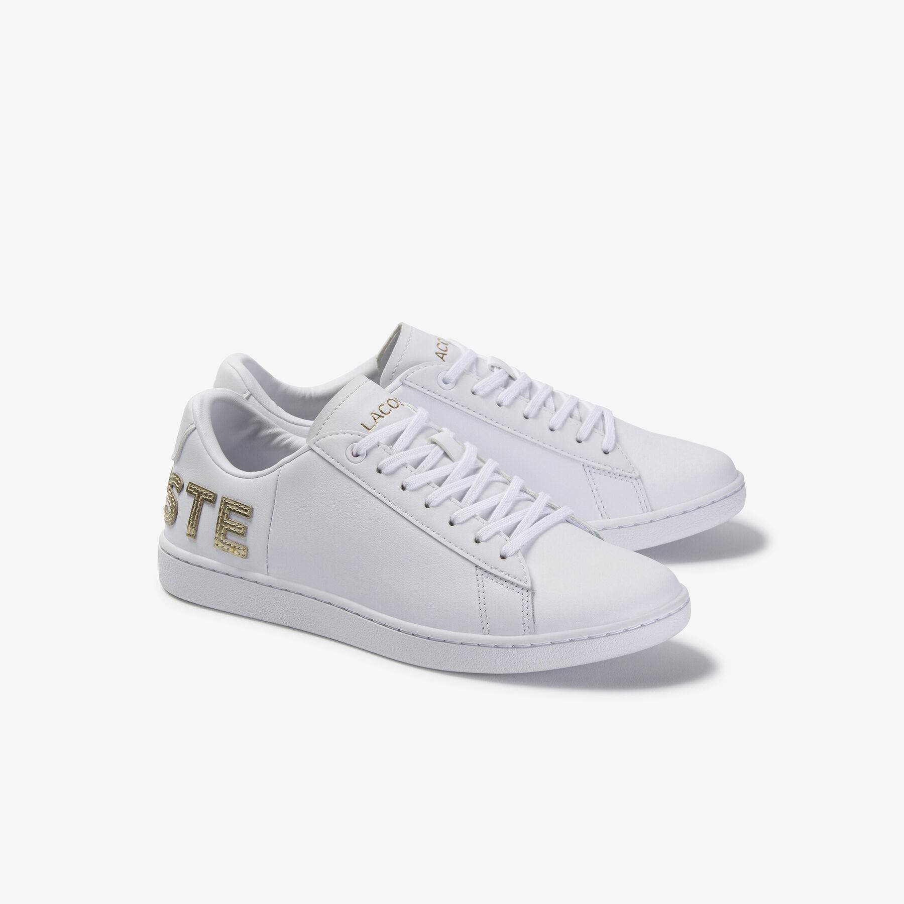 lacoste women s carnaby evo tonal leather and synthetic trainers