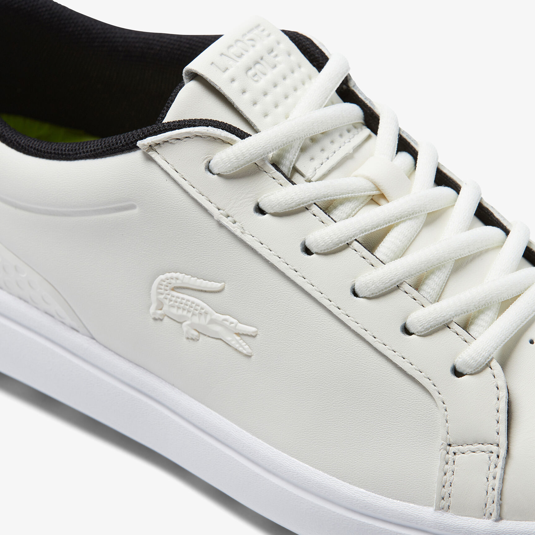 سنيكرز لاكوست جي اليت من خامات صناعية من نفس اللون للنساء سنيكرز لاكوست جي اليت من خامات صناعية من نفس اللون للنساء