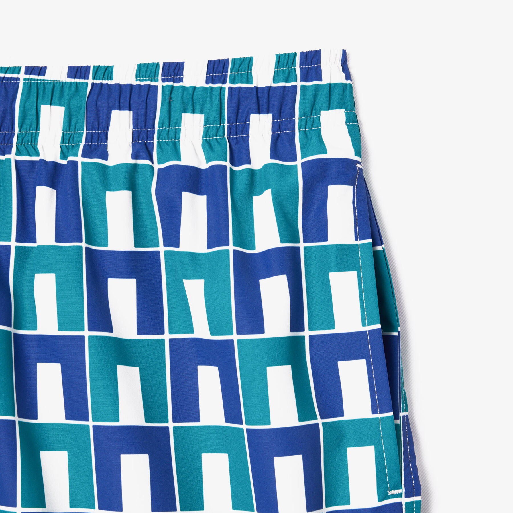 lacoste mid length robert george print swim trunks
