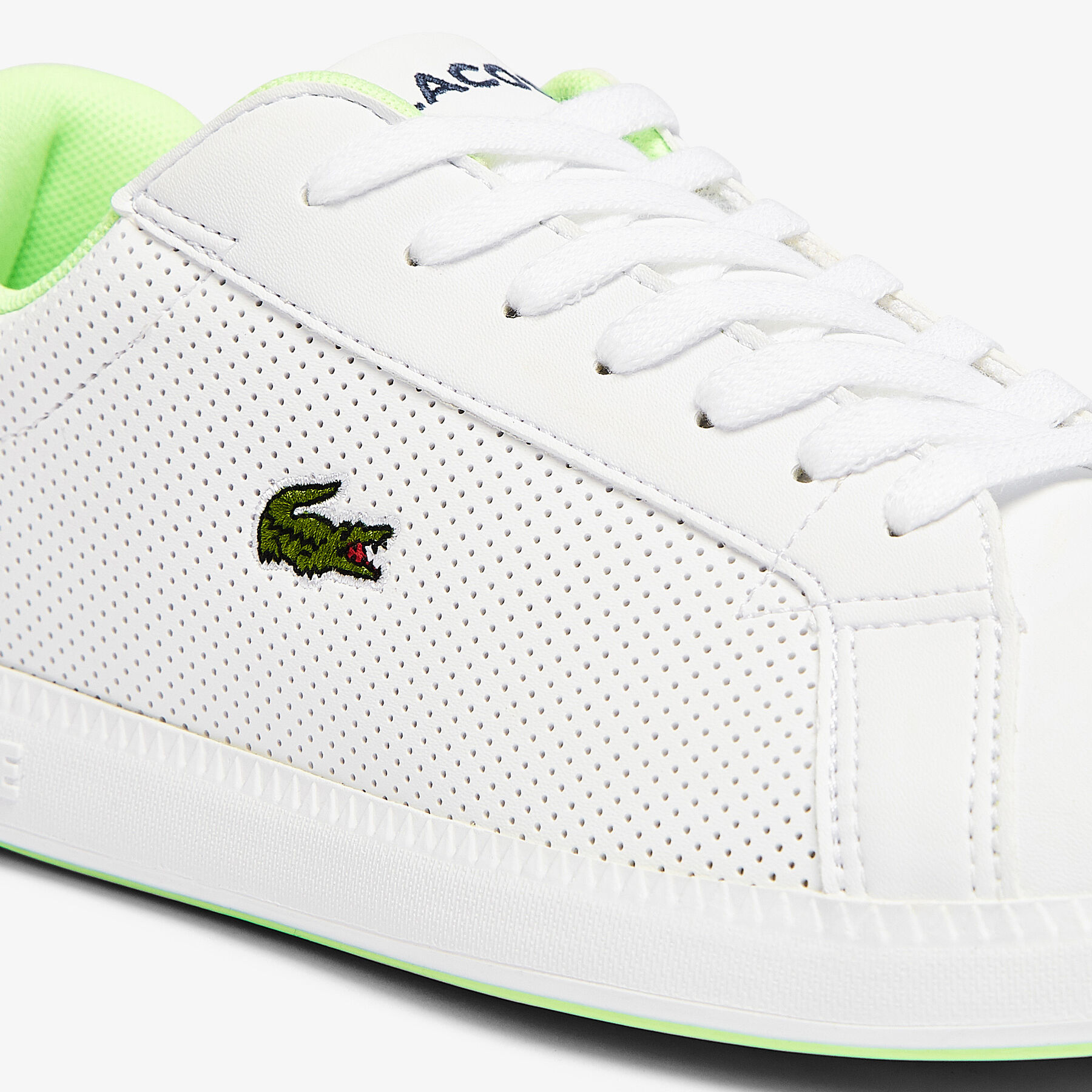 lacoste juniors  graduate synthetic perforated trainers