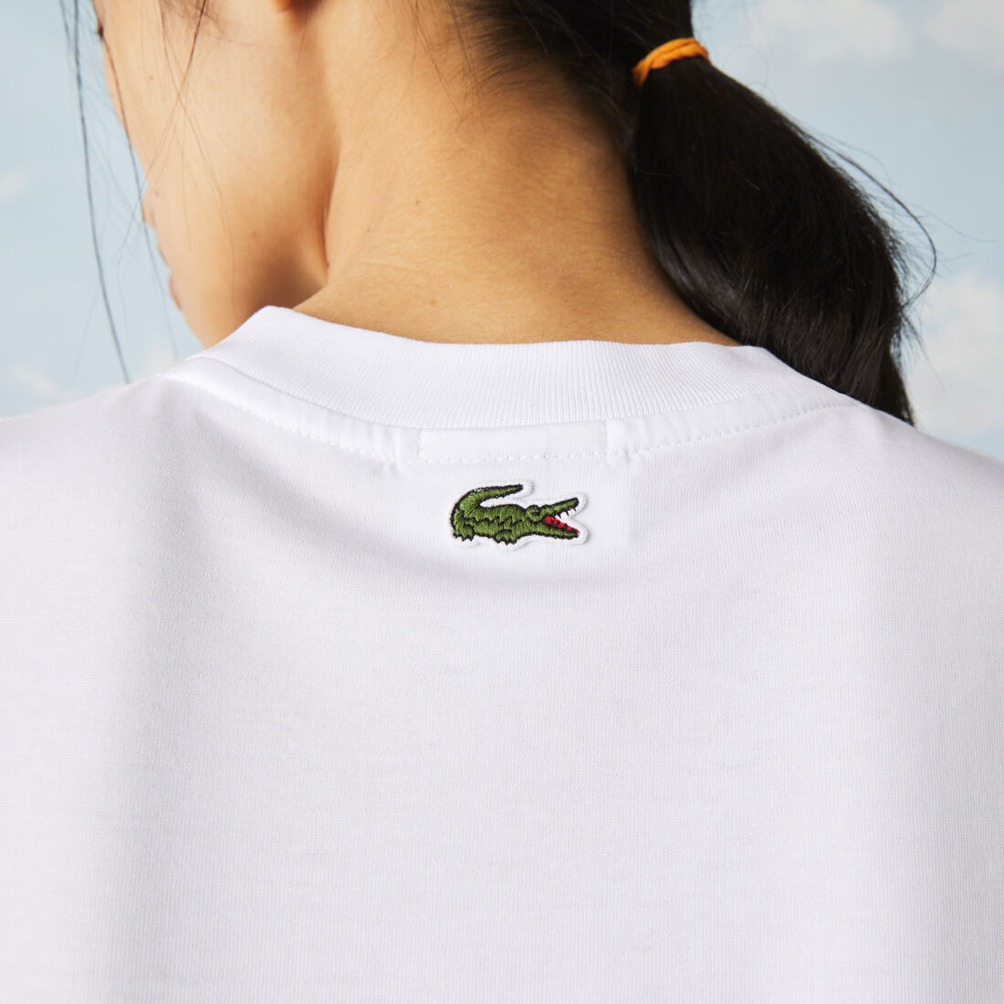 تي شيرت قطني للجنسين قصة فضفاضة من مجموعة Lacoste LIVE و Polaroid تي شيرت قطني للجنسين قصة فضفاضة من مجموعة Lacoste LIVE و Polaroid