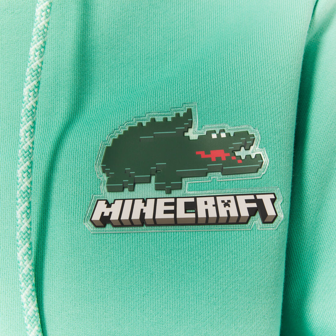 هودي صوف قطني للجنسين مجموعة Lacoste x Minecraft هودي صوف قطني للجنسين مجموعة Lacoste x Minecraft