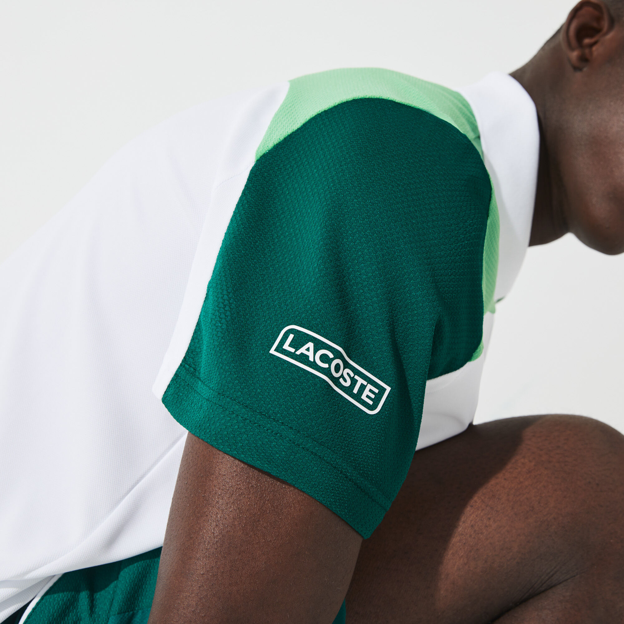 قميص بولو مسامي للتنس للرجال مع كتل لونية مجموعة Lacoste SPORT قميص بولو مسامي للتنس للرجال مع كتل لونية مجموعة Lacoste SPORT