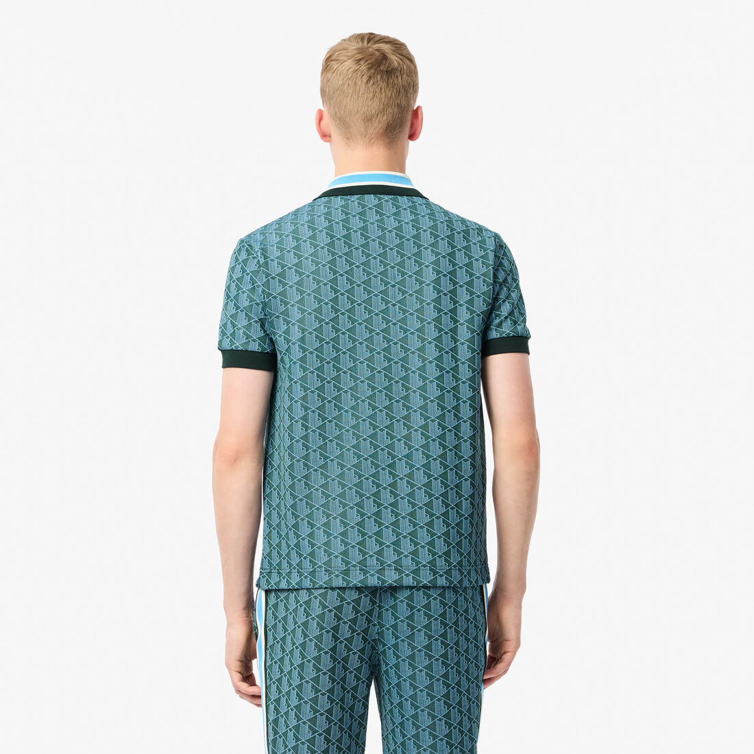 قميص بولو كلاسيكي بقصّة كلاسيكية من قماش الجاكار أحادي اللون قميص بولو كلاسيكي بقصّة كلاسيكية من قماش الجاكار أحادي اللون