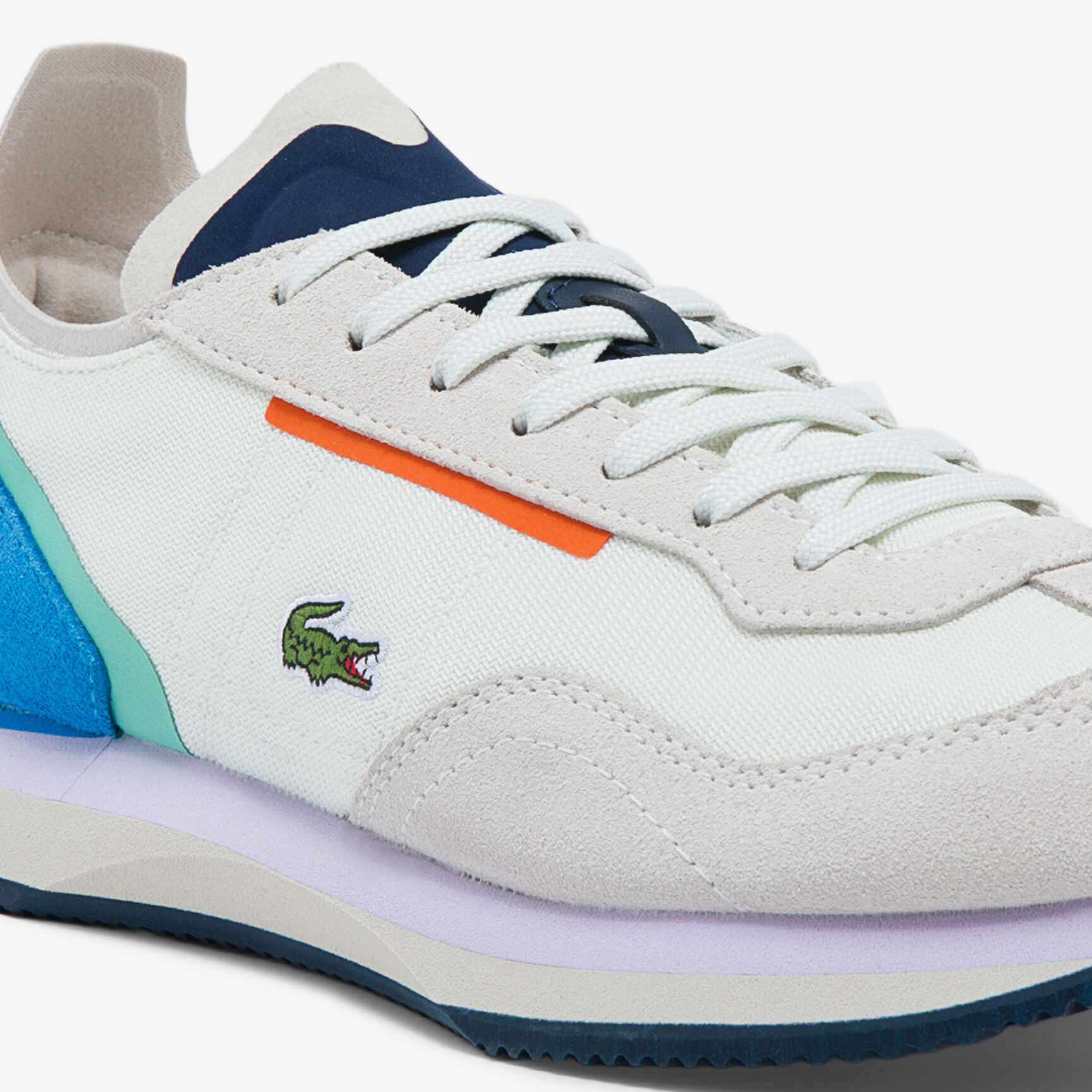 حذاء رياضي نسائي من النسيج والشمواه حذاء رياضي نسائي من النسيج والشمواه