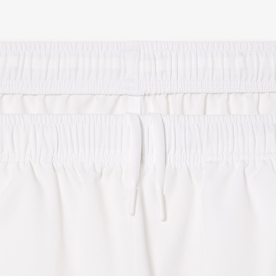 شورت تنس خفيف الوزن غير مُبطن شورت تنس خفيف الوزن غير مُبطن