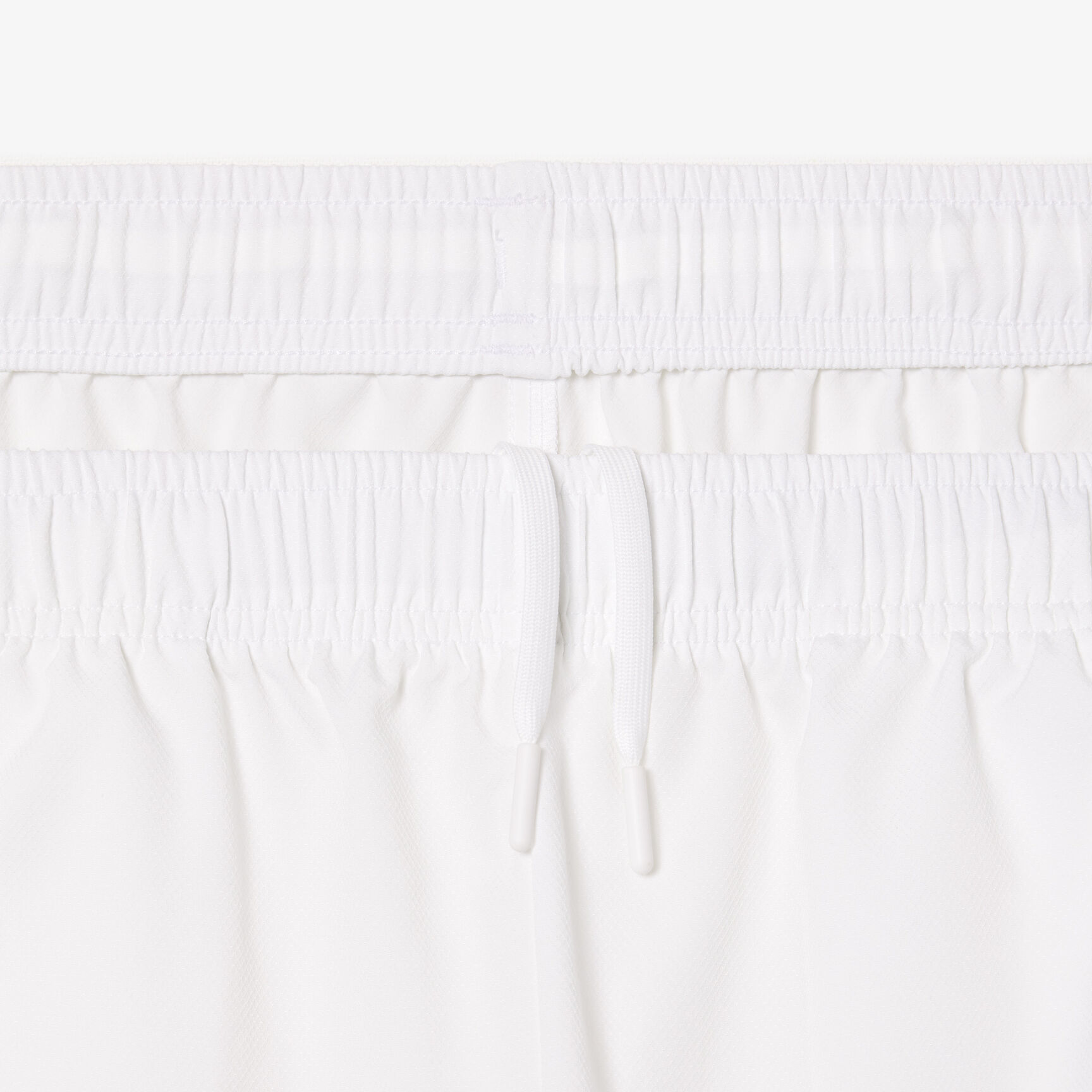 شورت تنس خفيف الوزن غير مُبطن شورت تنس خفيف الوزن غير مُبطن