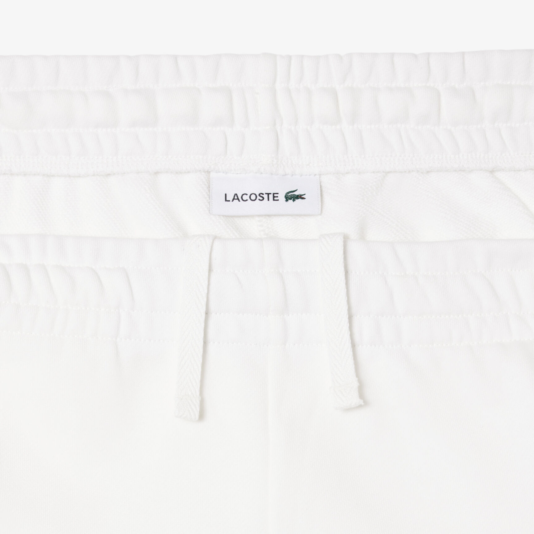 بنطال رياضي بقصّة مستقيمة وشعار الماركة