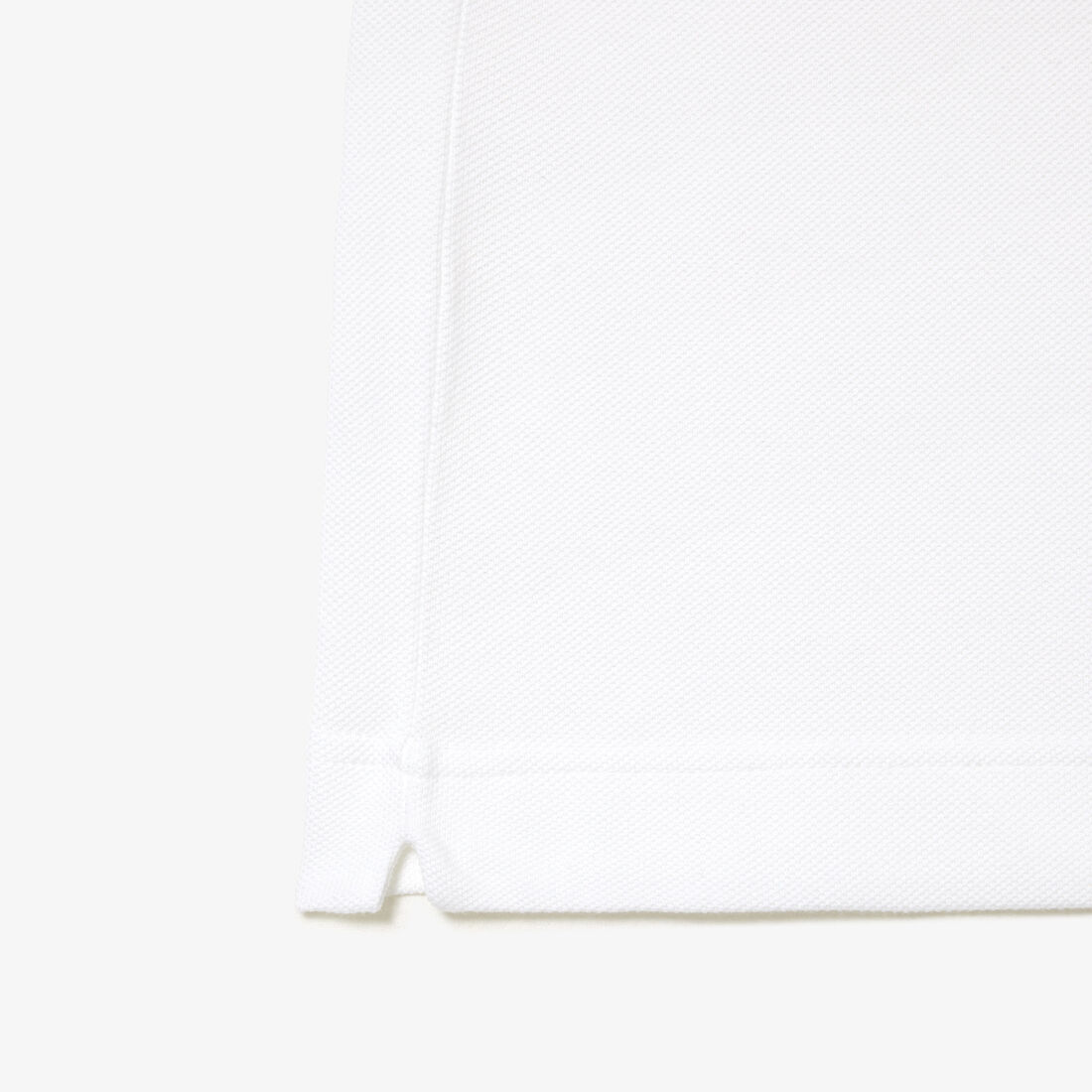 تي شيرت بولو بطبعة رقع بلونين من مجموعة Original L.12.12 تي شيرت بولو بطبعة رقع بلونين من مجموعة Original L.12.12