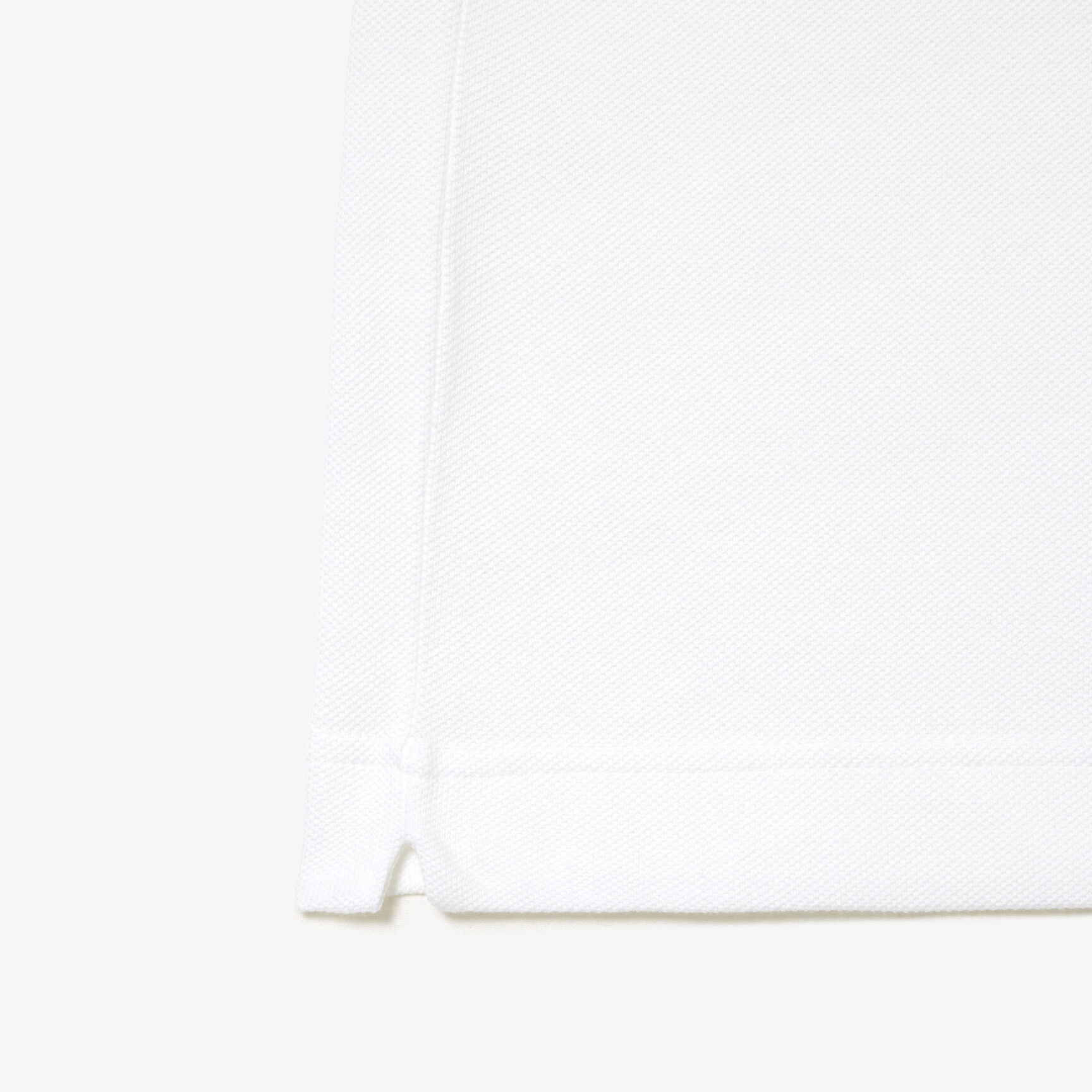 تي شيرت بولو بطبعة رقع بلونين من مجموعة Original L.12.12 تي شيرت بولو بطبعة رقع بلونين من مجموعة Original L.12.12