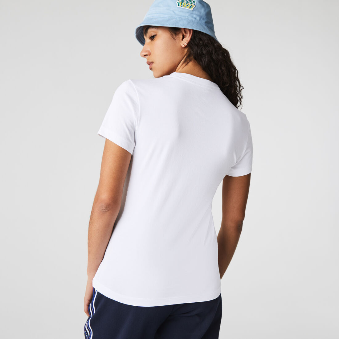 تيشيرت نسائي من مجموعة Lacoste SPORT يسمح بمرور الهواء ومزين بنقشة مربعات تيشيرت نسائي من مجموعة Lacoste SPORT يسمح بمرور الهواء ومزين بنقشة مربعات