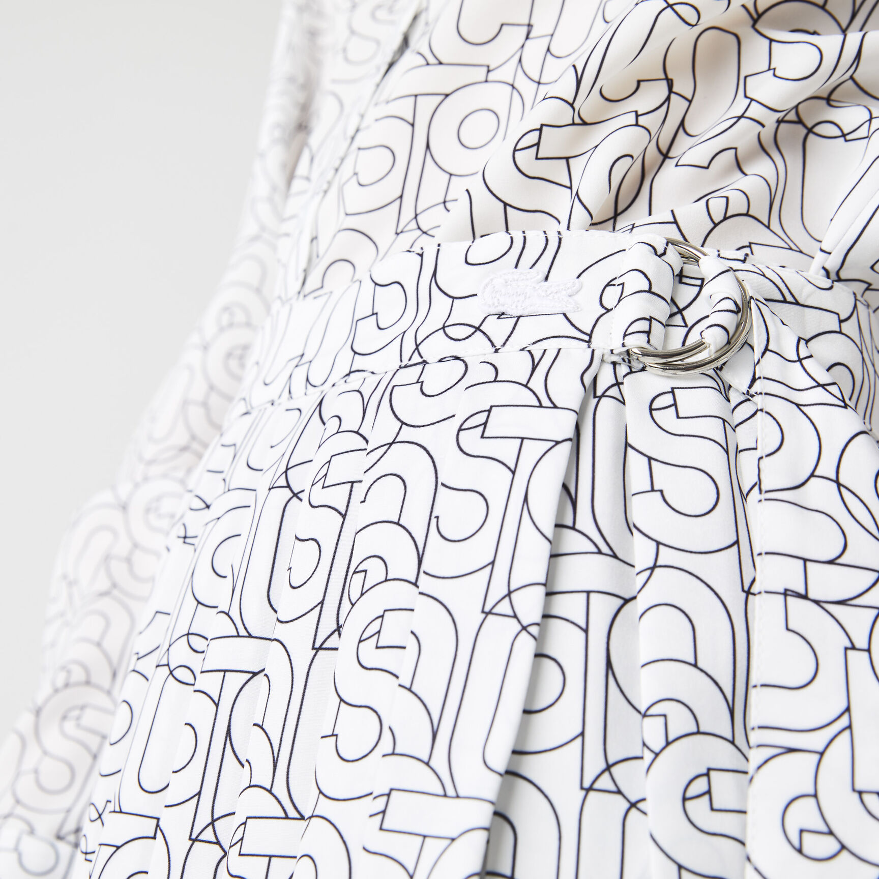 تنورة نسائية متوسطة الطول بطيات منقوشة من Lacoste تنورة نسائية متوسطة الطول بطيات منقوشة من Lacoste