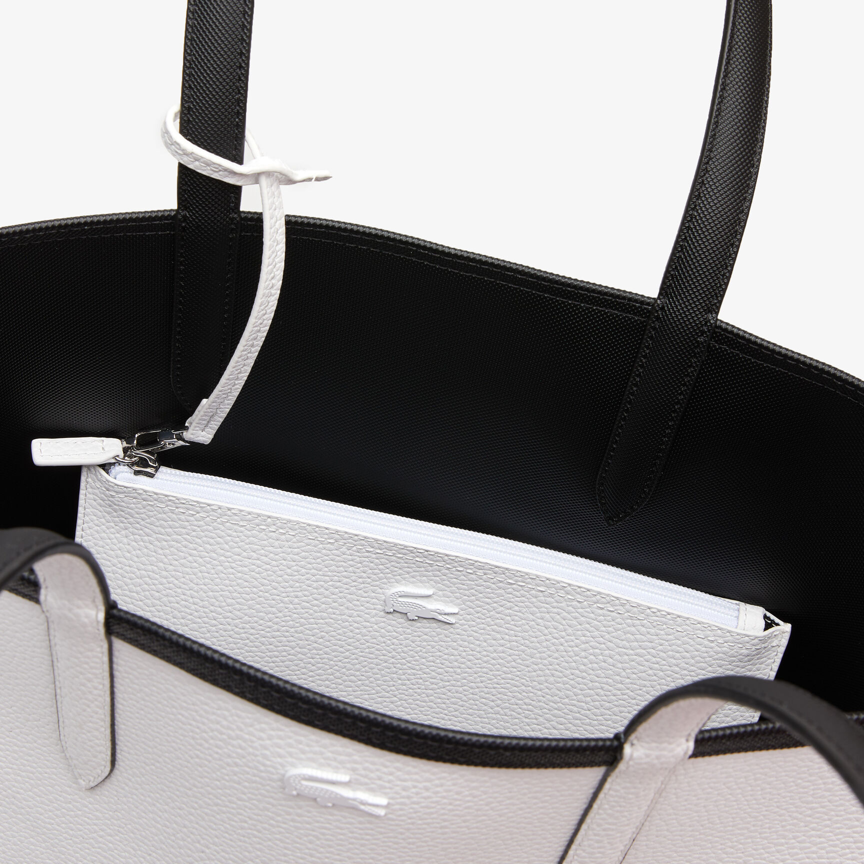 حقيبة يد لاكوست بوجهين وشعار الماركة بلون مغاير للنساء