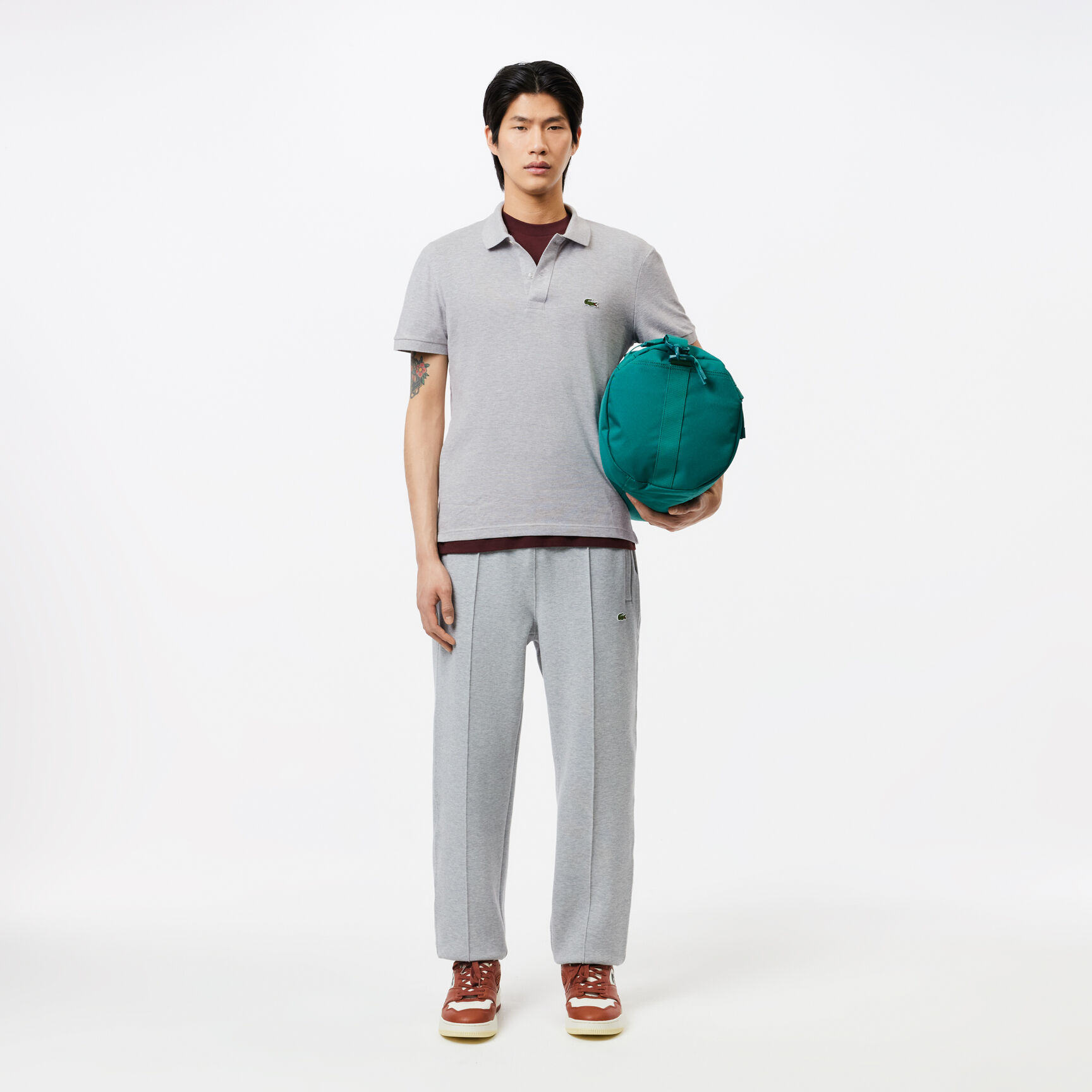 قميص بولو بيكيه بقصة ضيقة L.12.12 قميص بولو بيكيه بقصة ضيقة L.12.12