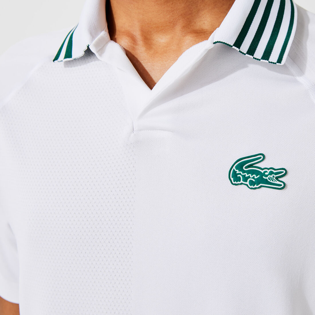 بولو Lacoste SPORT للرجال بقصّة عادية وسهل التهوية بولو Lacoste SPORT للرجال بقصّة عادية وسهل التهوية