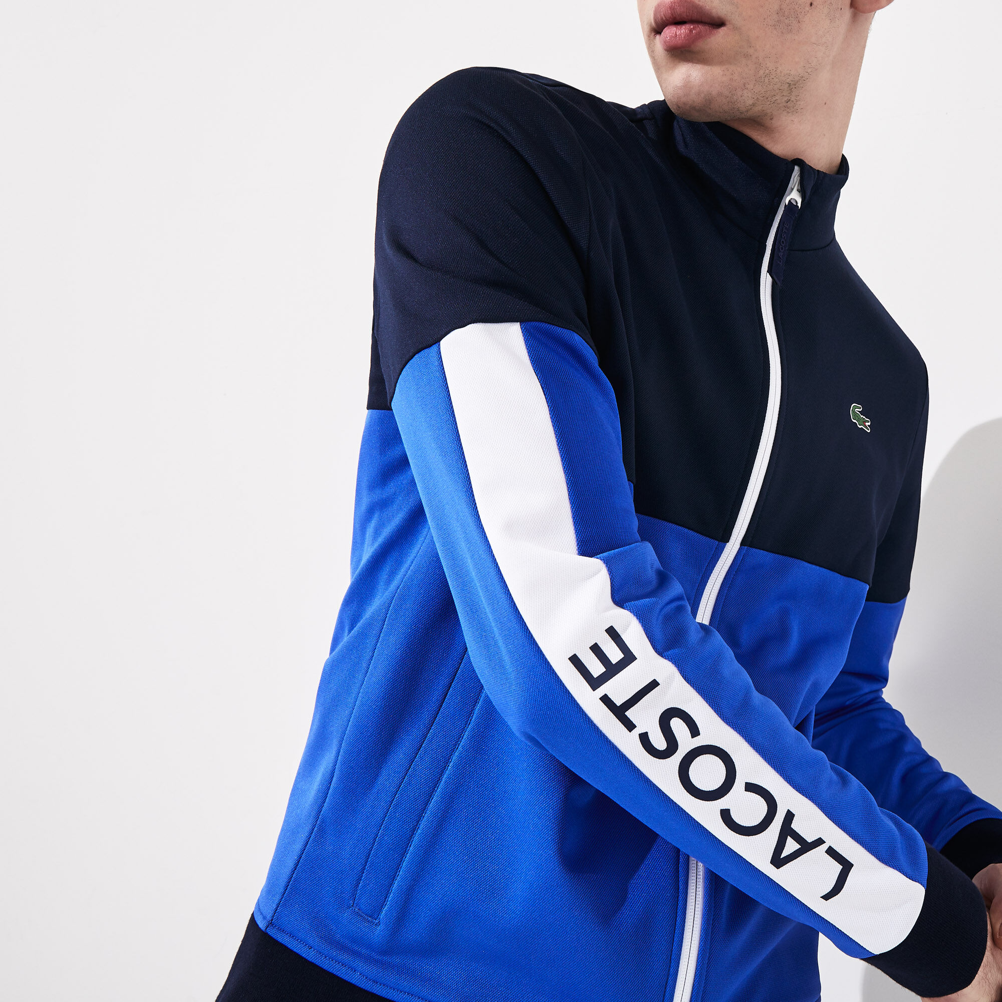 قميص ثقيل بسحاب من البيكيه المقاوم للمياه متعدد الألوان من مجموعة Lacoste SPORT للرجال قميص ثقيل بسحاب من البيكيه المقاوم للمياه متعدد الألوان من مجموعة Lacoste SPORT للرجال