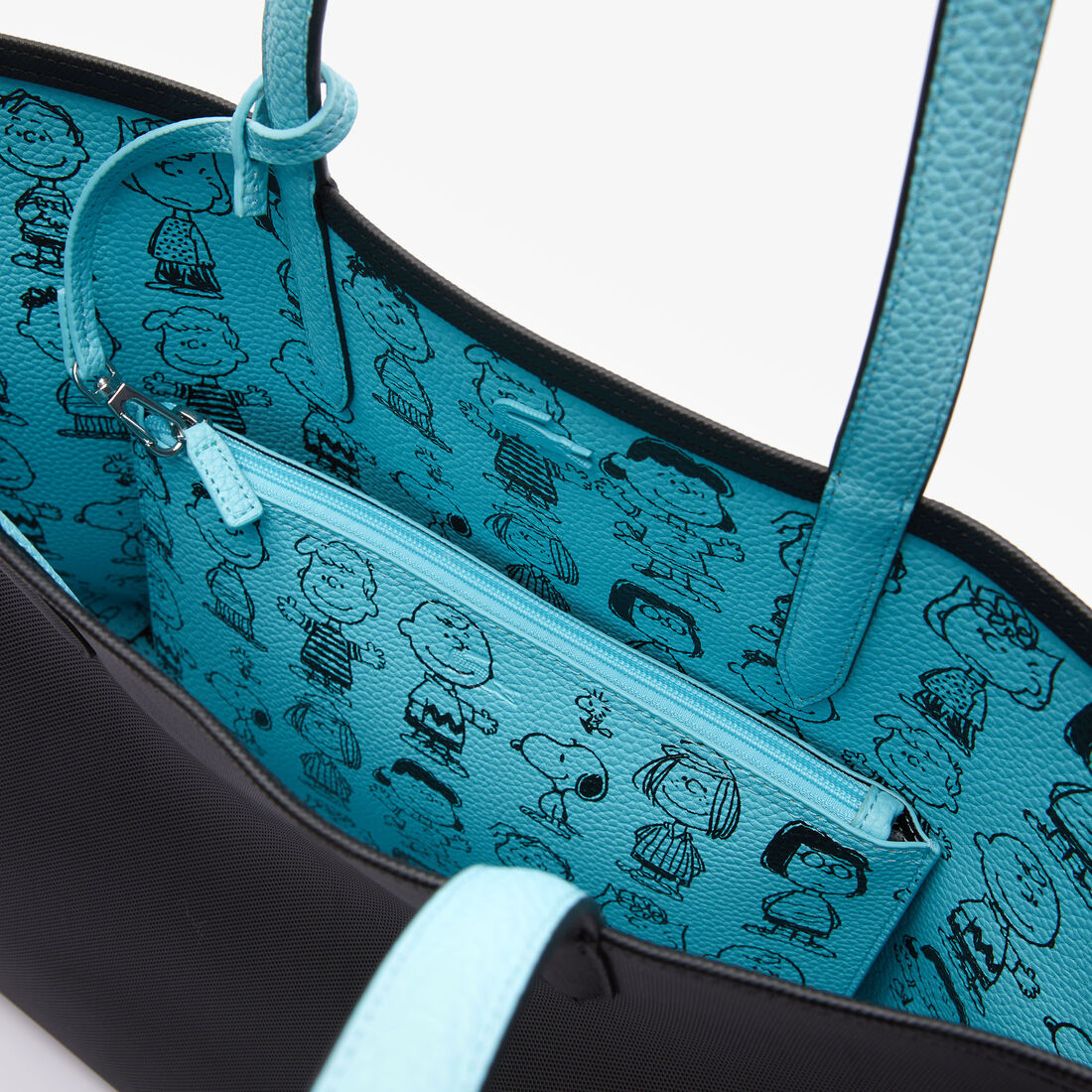 حقيبة تسوق كبيرة للنساء من Lacoste x Peanuts بسحاب حقيبة تسوق كبيرة للنساء من Lacoste x Peanuts بسحاب