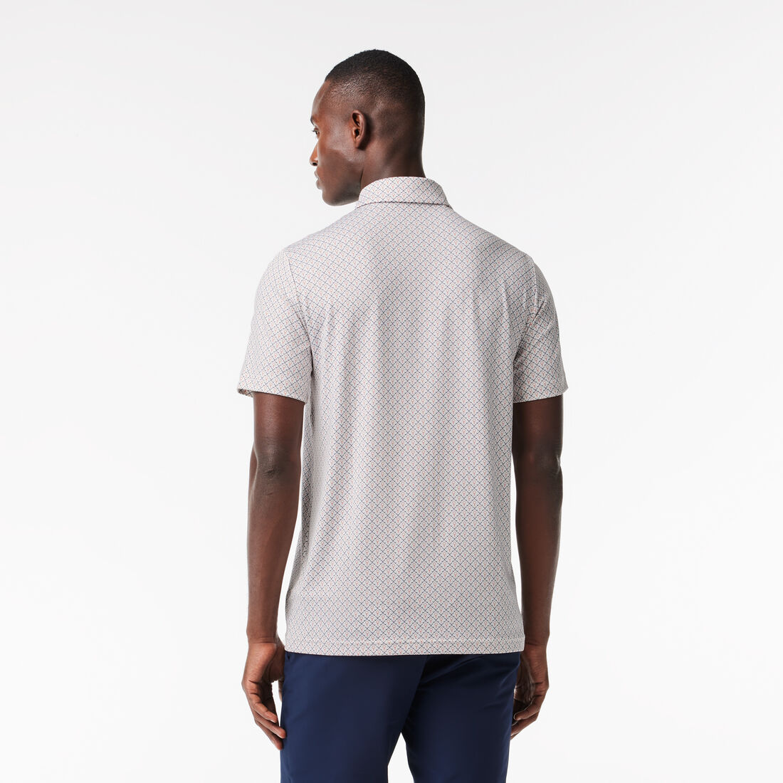 تي شيرت بولو قطن مطاطي بقصّة عادية ومزين بشريط يحمل كلمة Lacoste تي شيرت بولو قطن مطاطي بقصّة عادية ومزين بشريط يحمل كلمة Lacoste