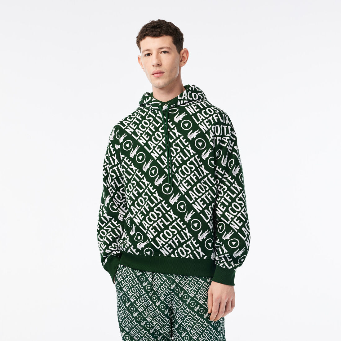 سويت شيرت قطن عضوي بقصة فضفاضة للرجال مجموعة Lacoste x Netflix